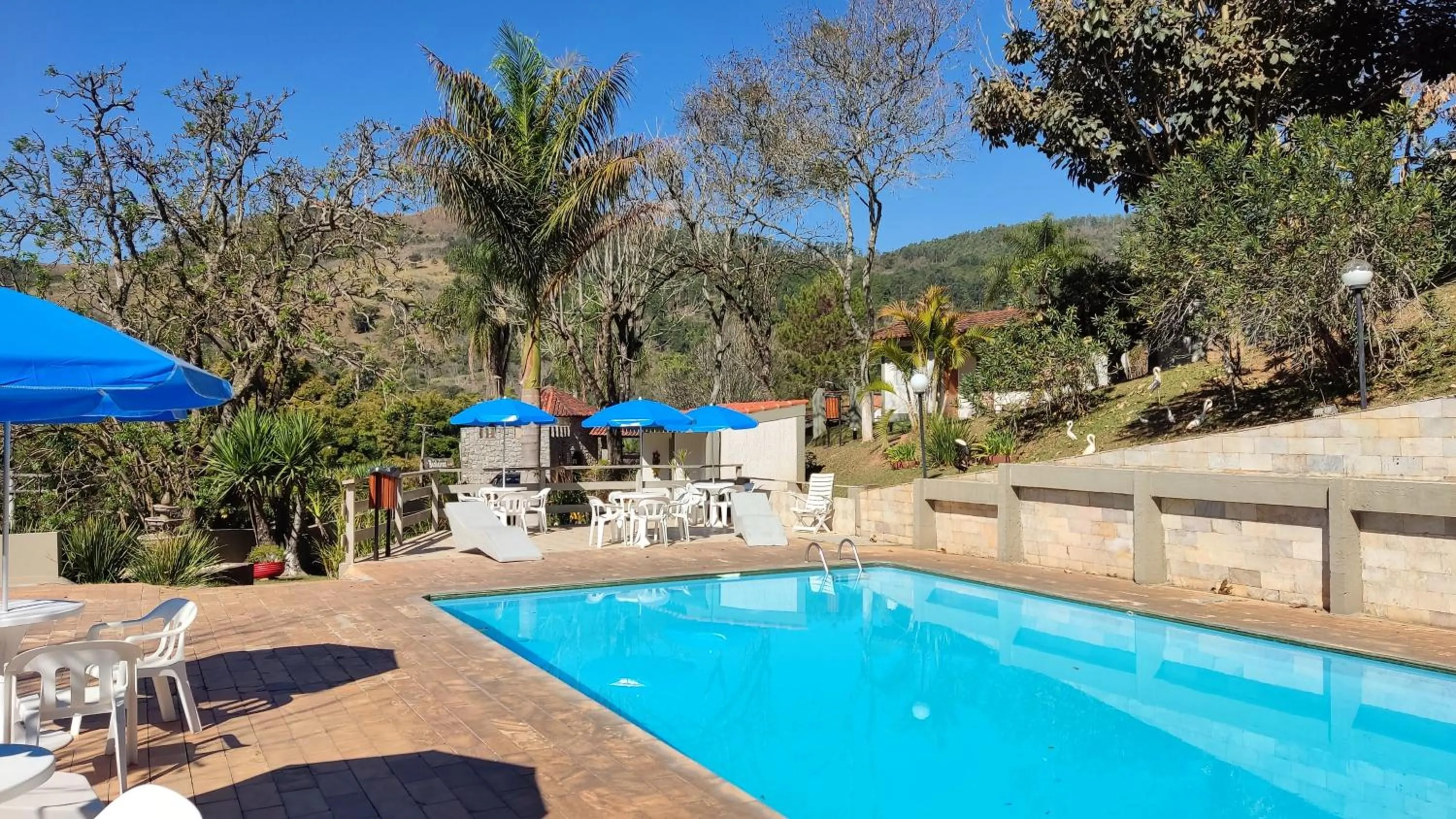 Pool view in Chalés Vila da Serra
