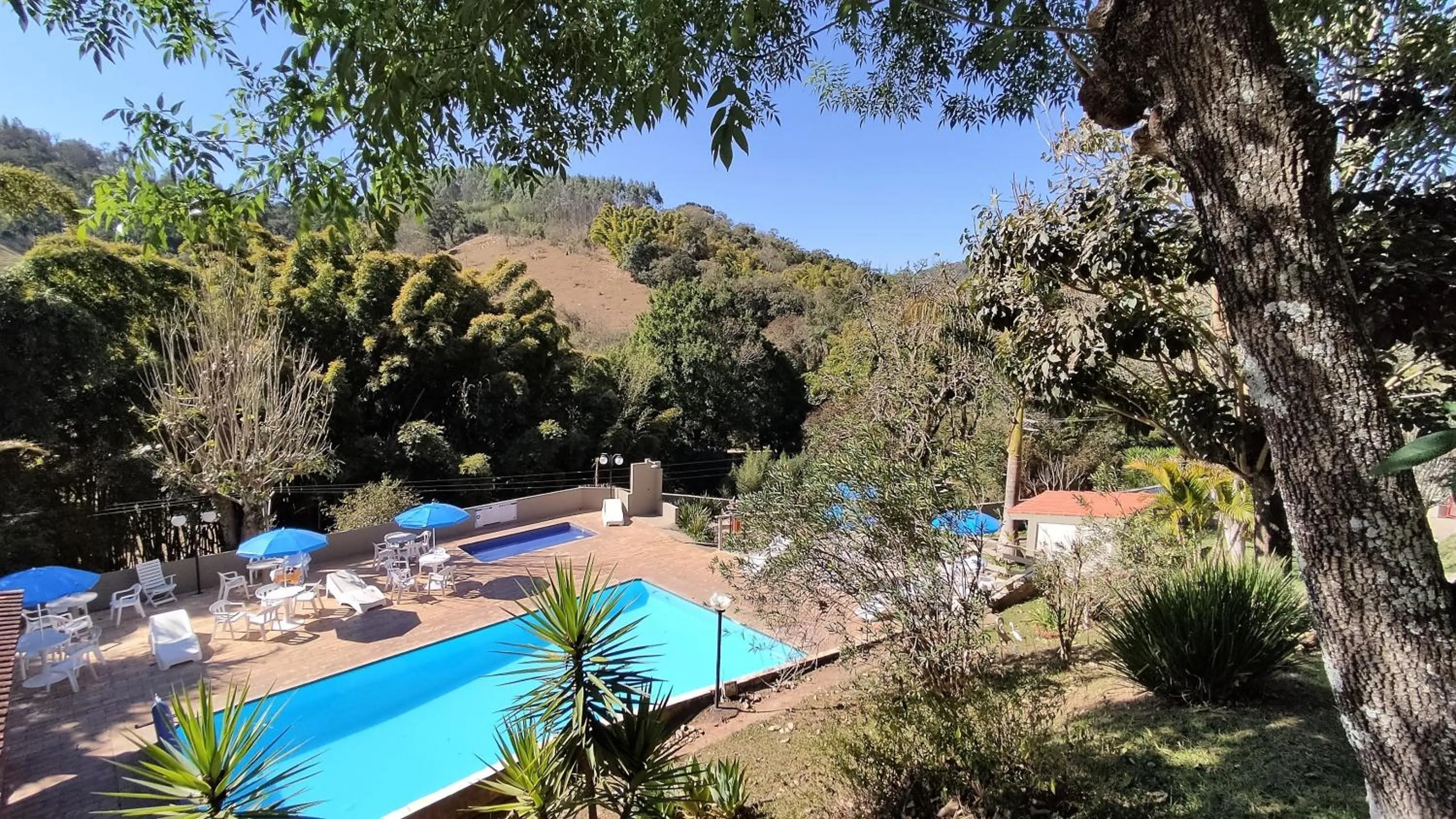 Pool view in Chalés Vila da Serra
