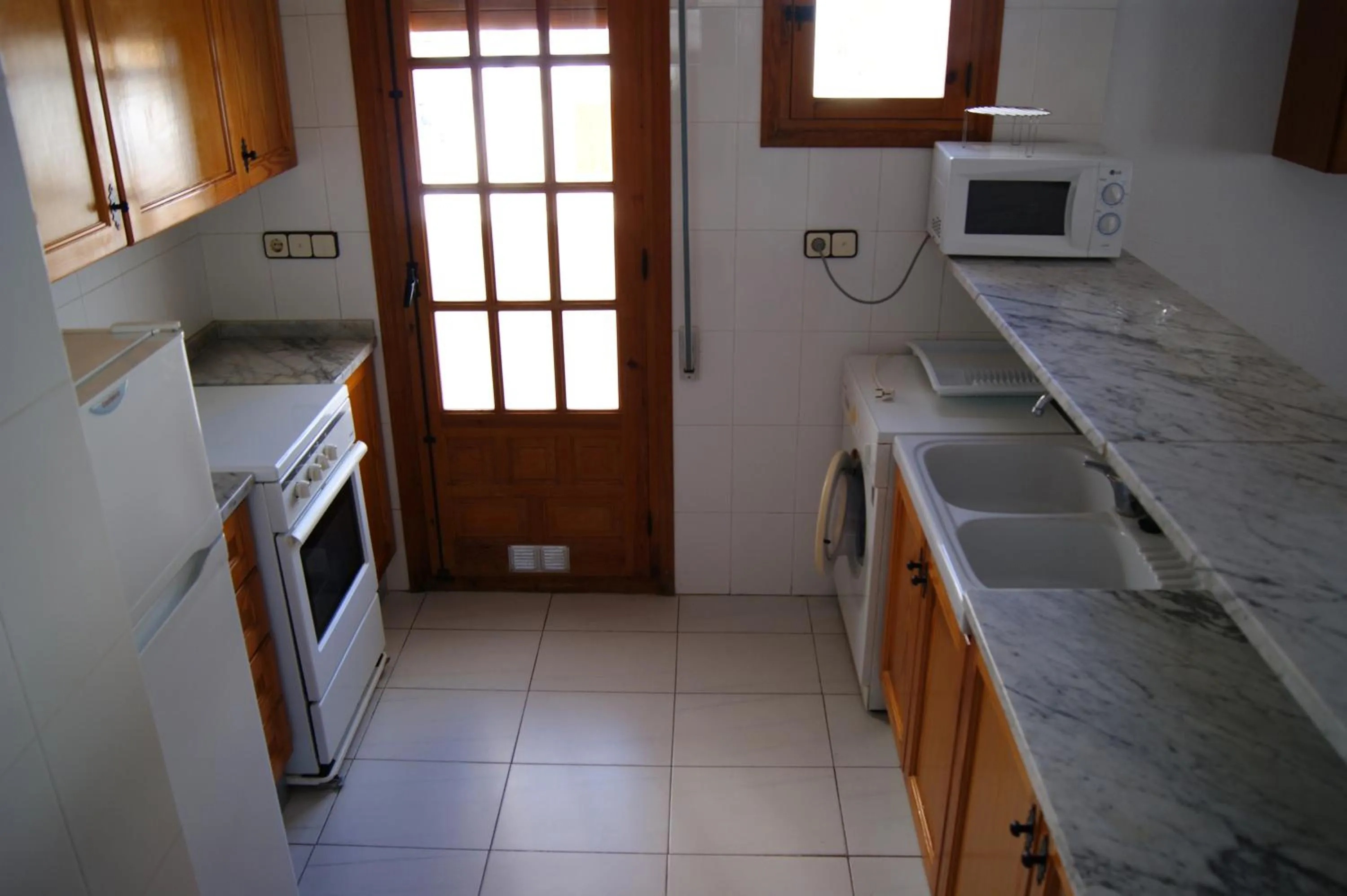 Kitchen or kitchenette in Alquileres Cap y Corp