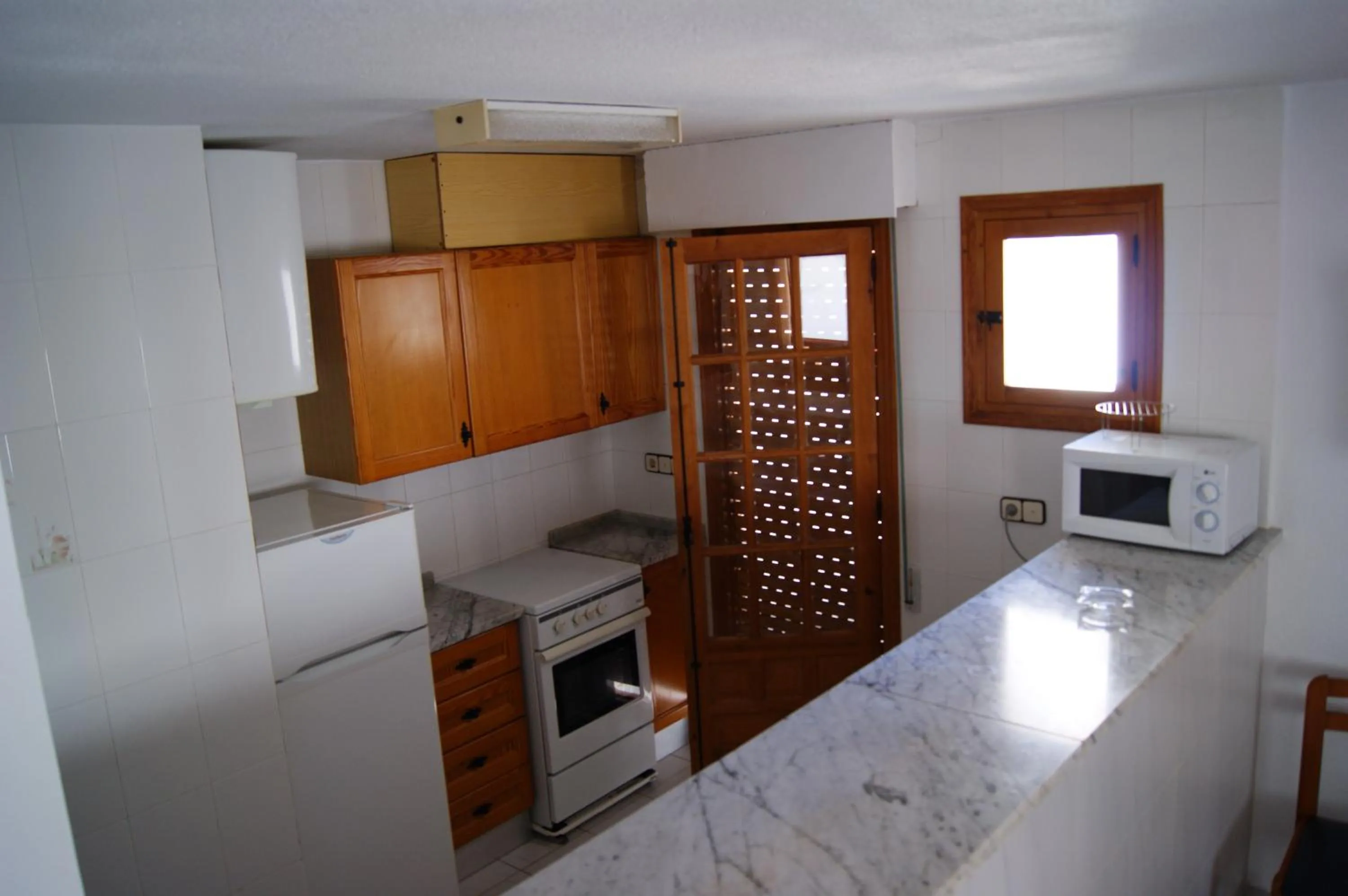 Kitchen or kitchenette in Alquileres Cap y Corp