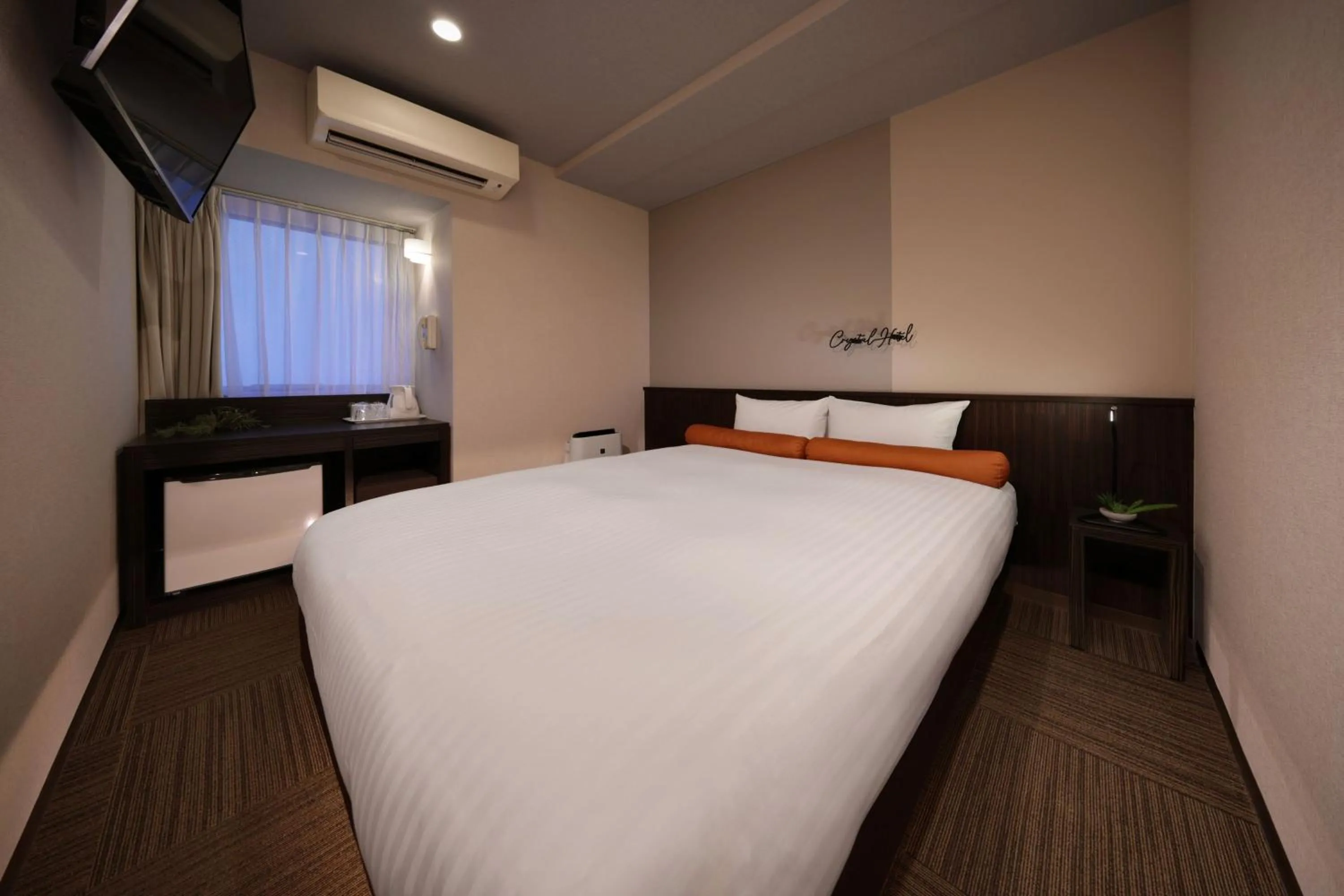 Bed in Nipponbashi Crystal Hotel
