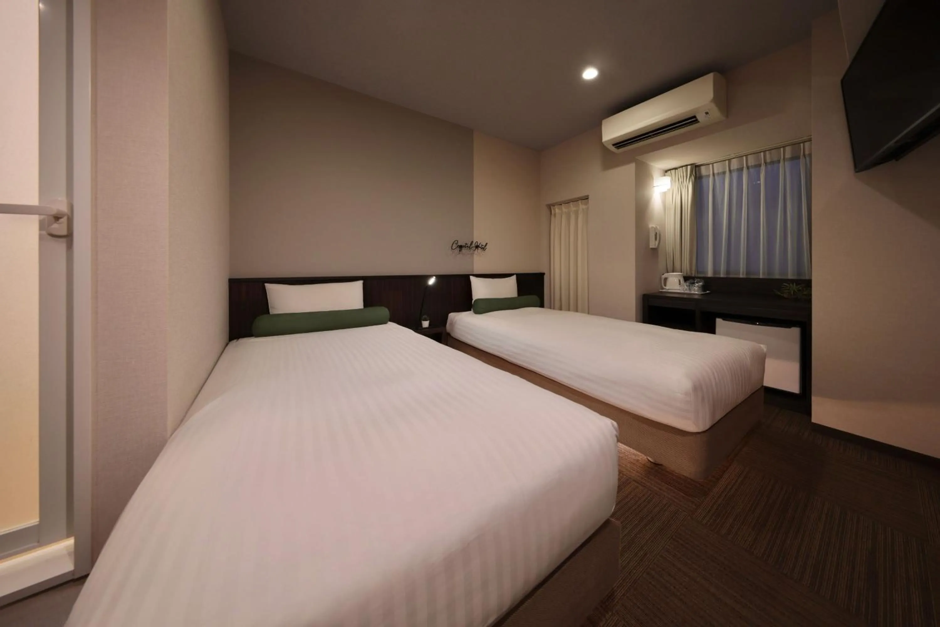 Bed in Nipponbashi Crystal Hotel