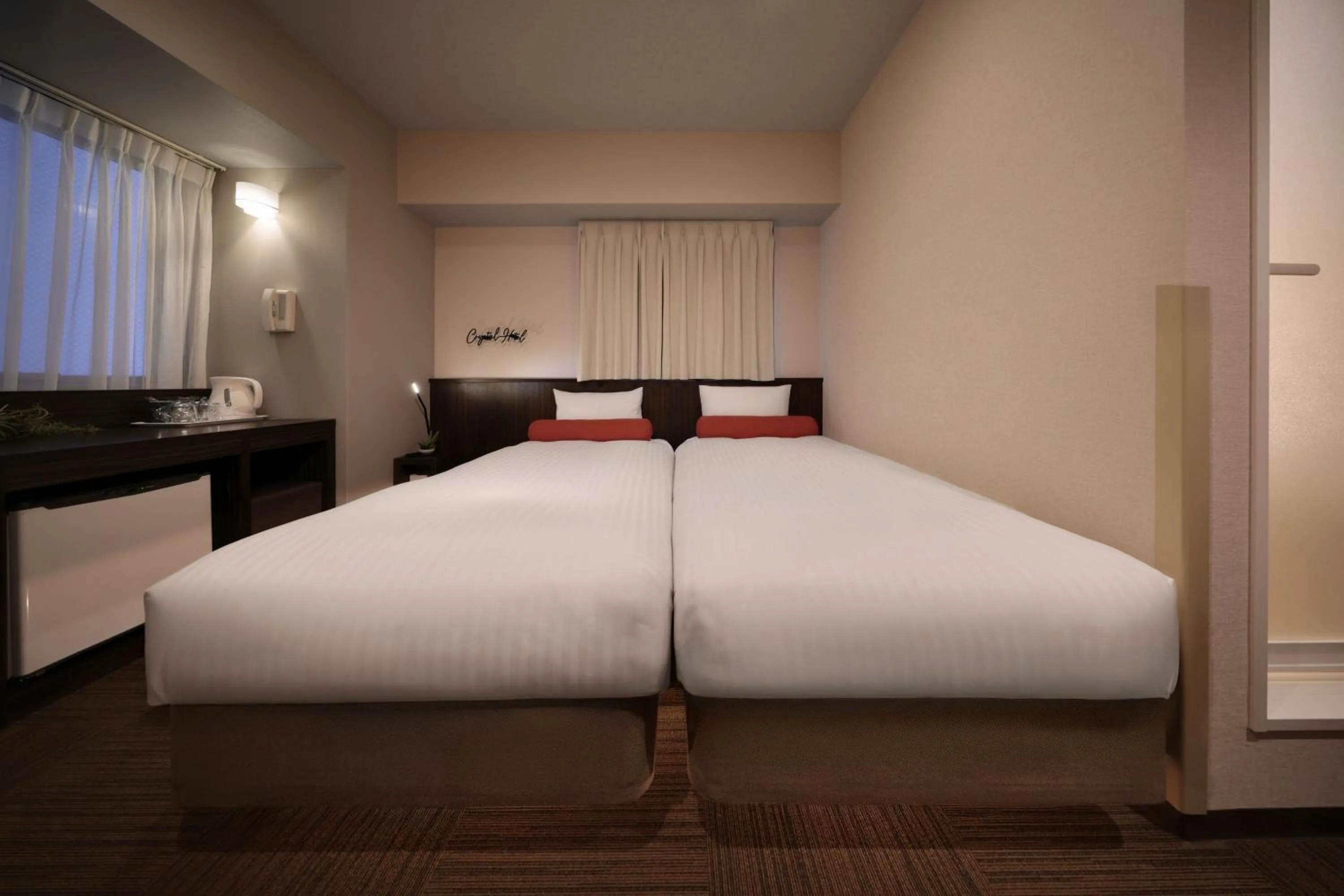 Bed in Nipponbashi Crystal Hotel