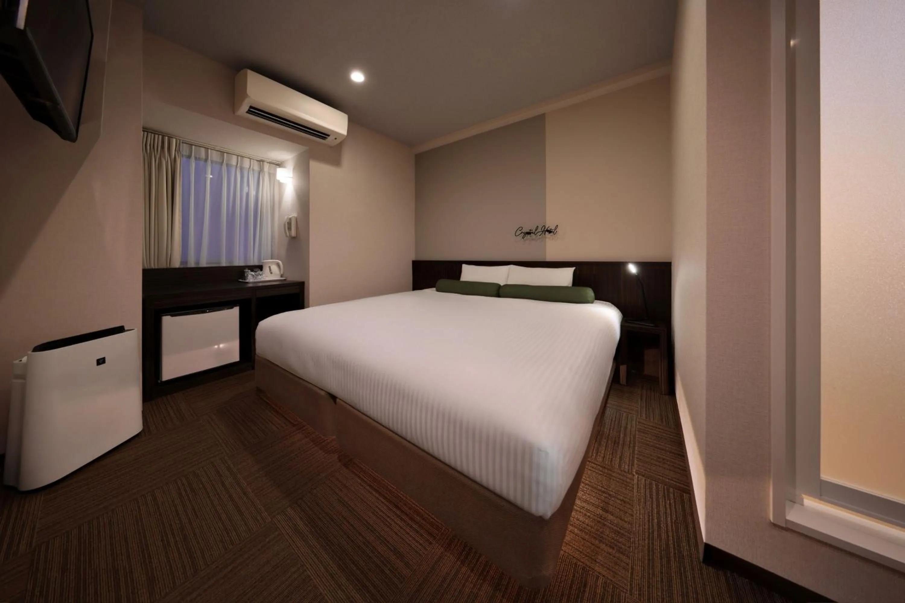 Bed in Nipponbashi Crystal Hotel