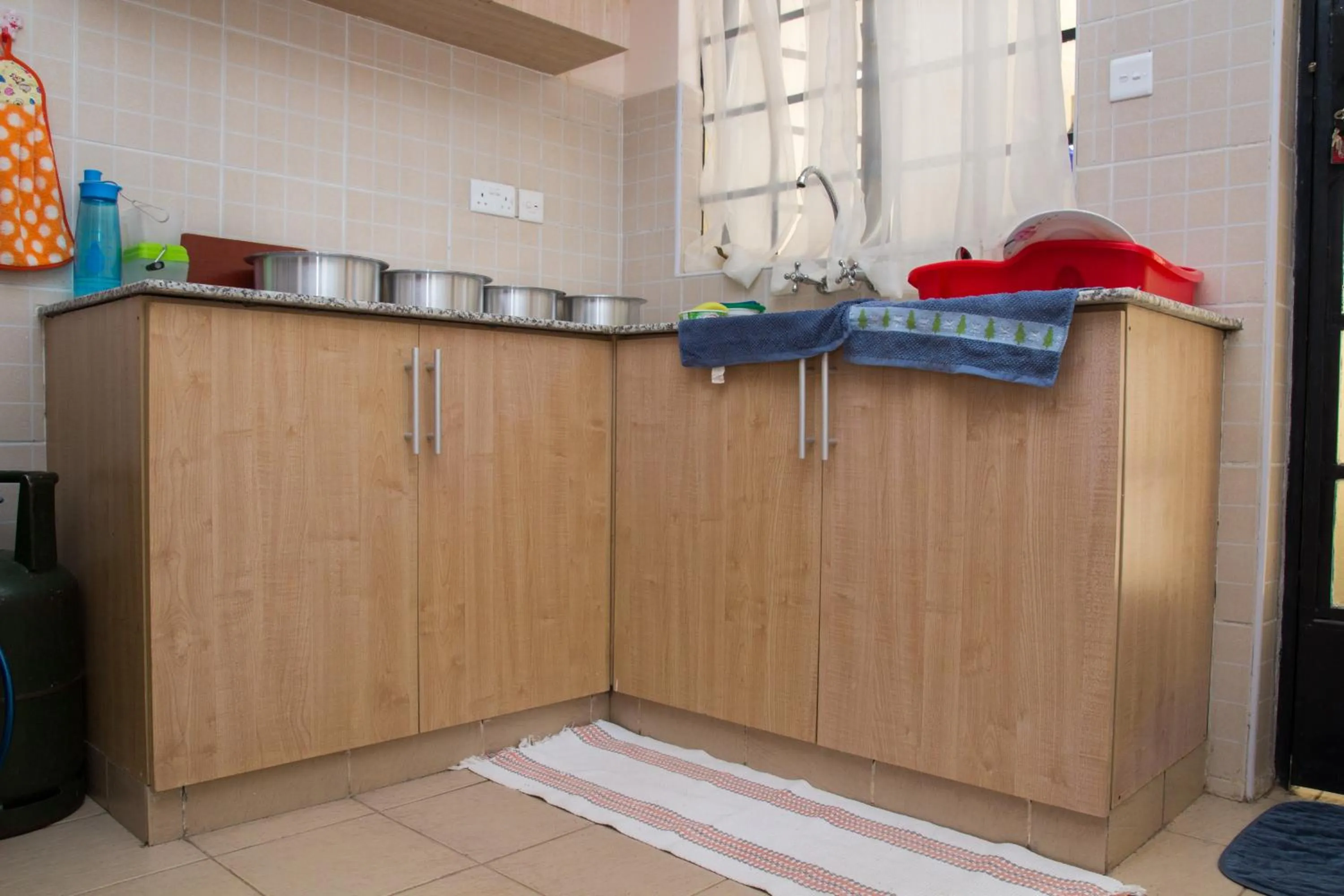 Communal kitchen in Nairobi Airport Apartments