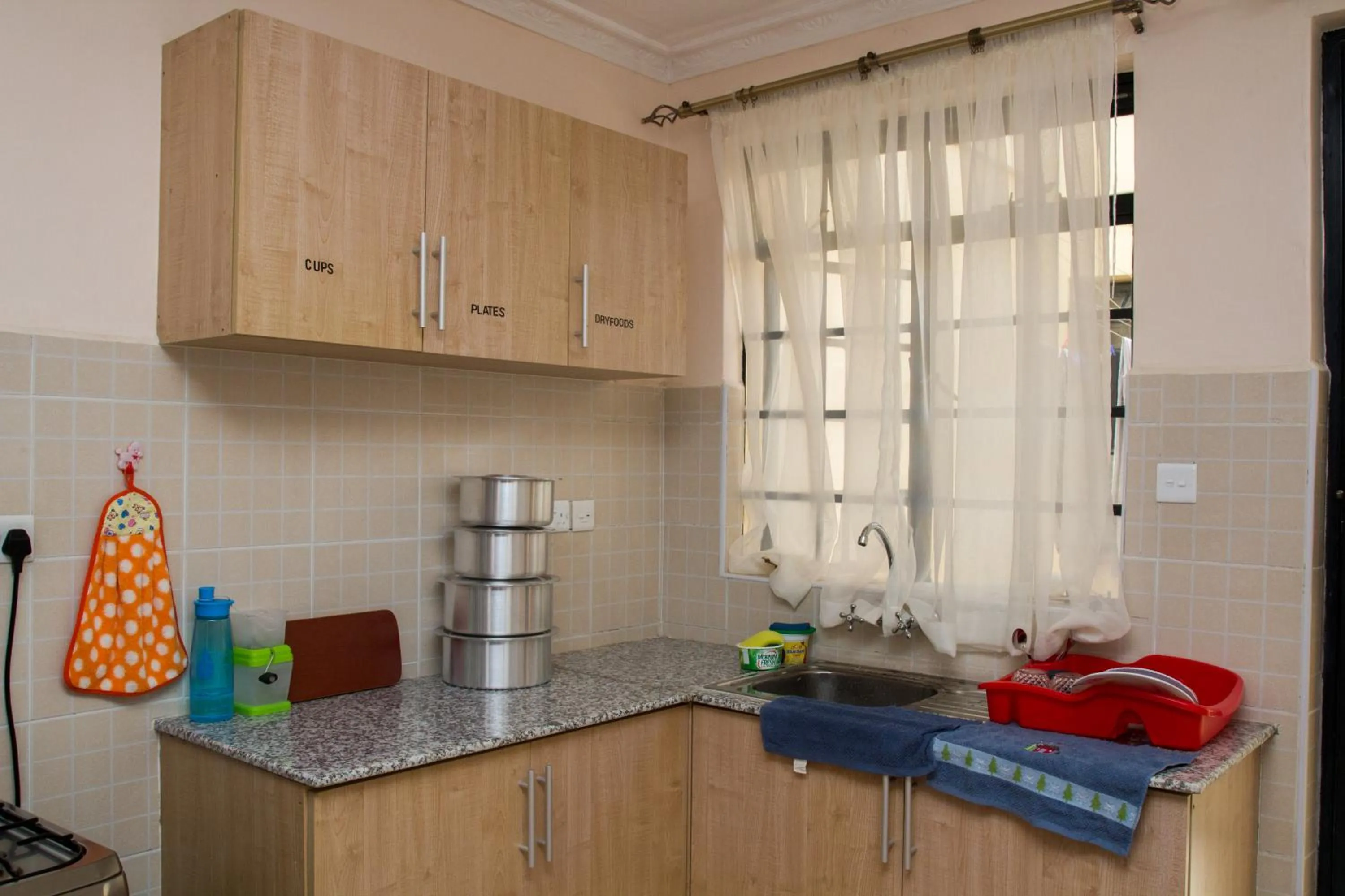 Communal kitchen in Nairobi Airport Apartments