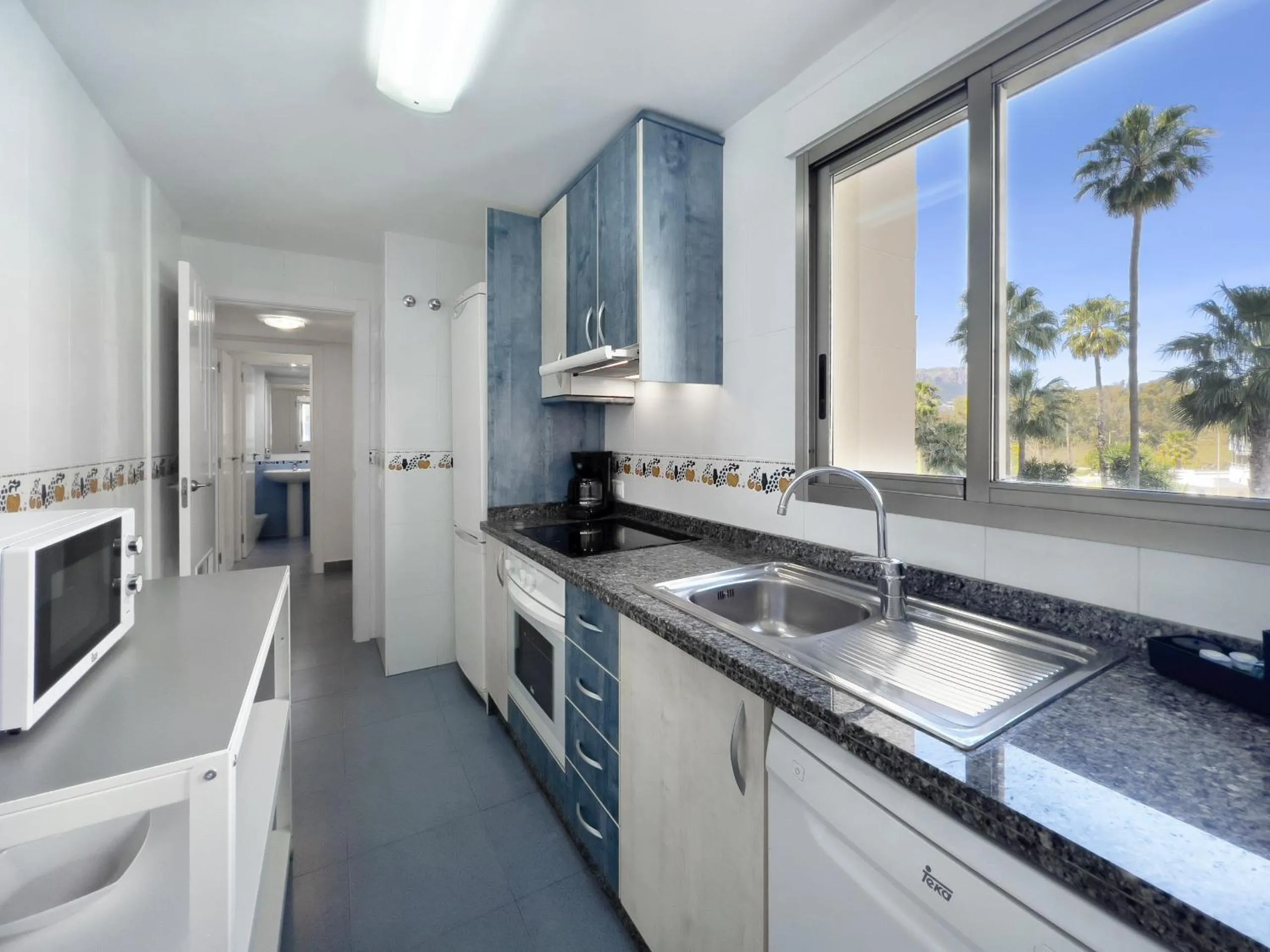 Kitchen or kitchenette in Apartamentos Hipocampos Calpe Rent Apart