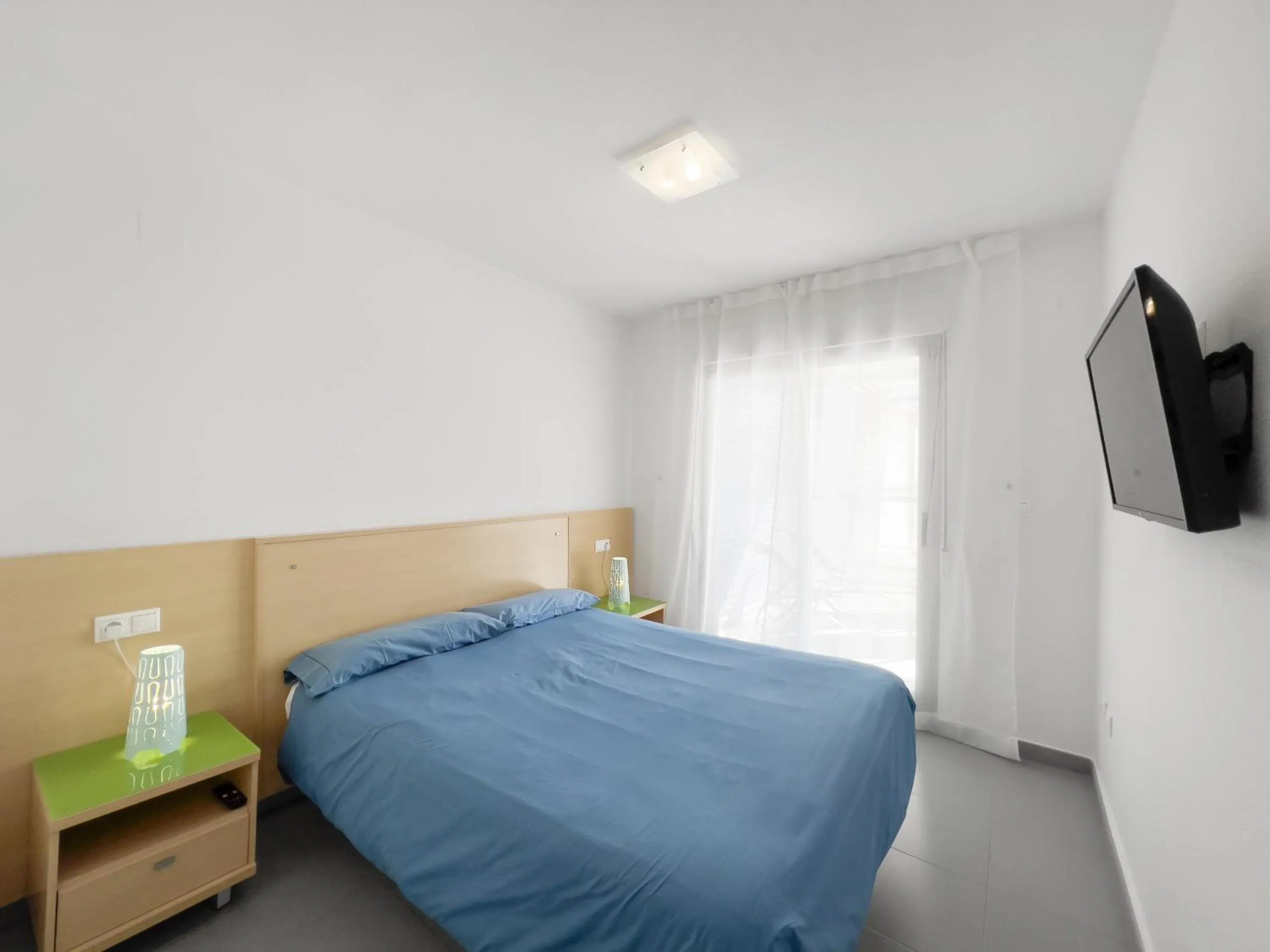 Bed in Apartamentos Hipocampos Calpe Rent Apart
