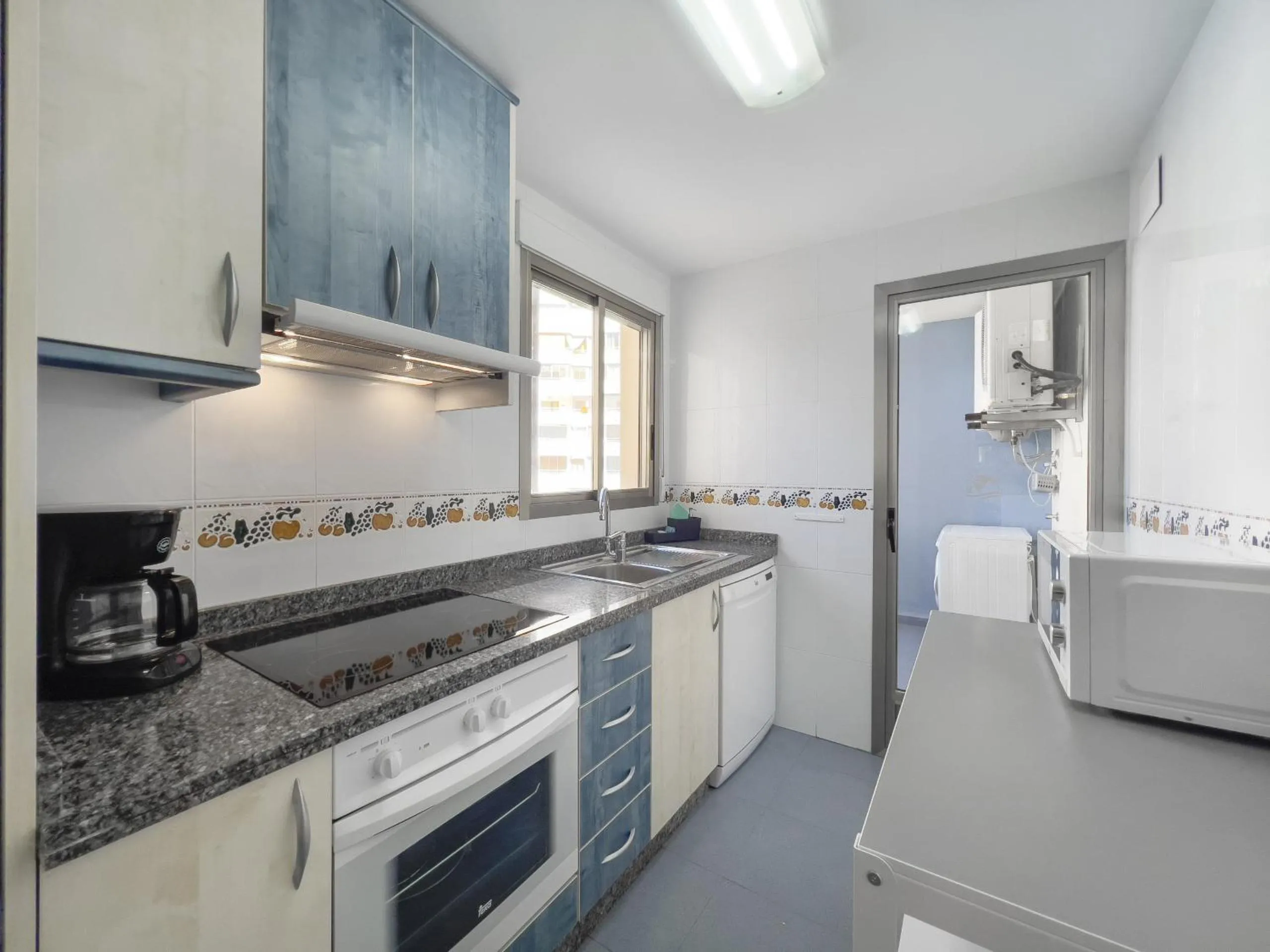 Kitchen or kitchenette in Apartamentos Hipocampos Calpe Rent Apart