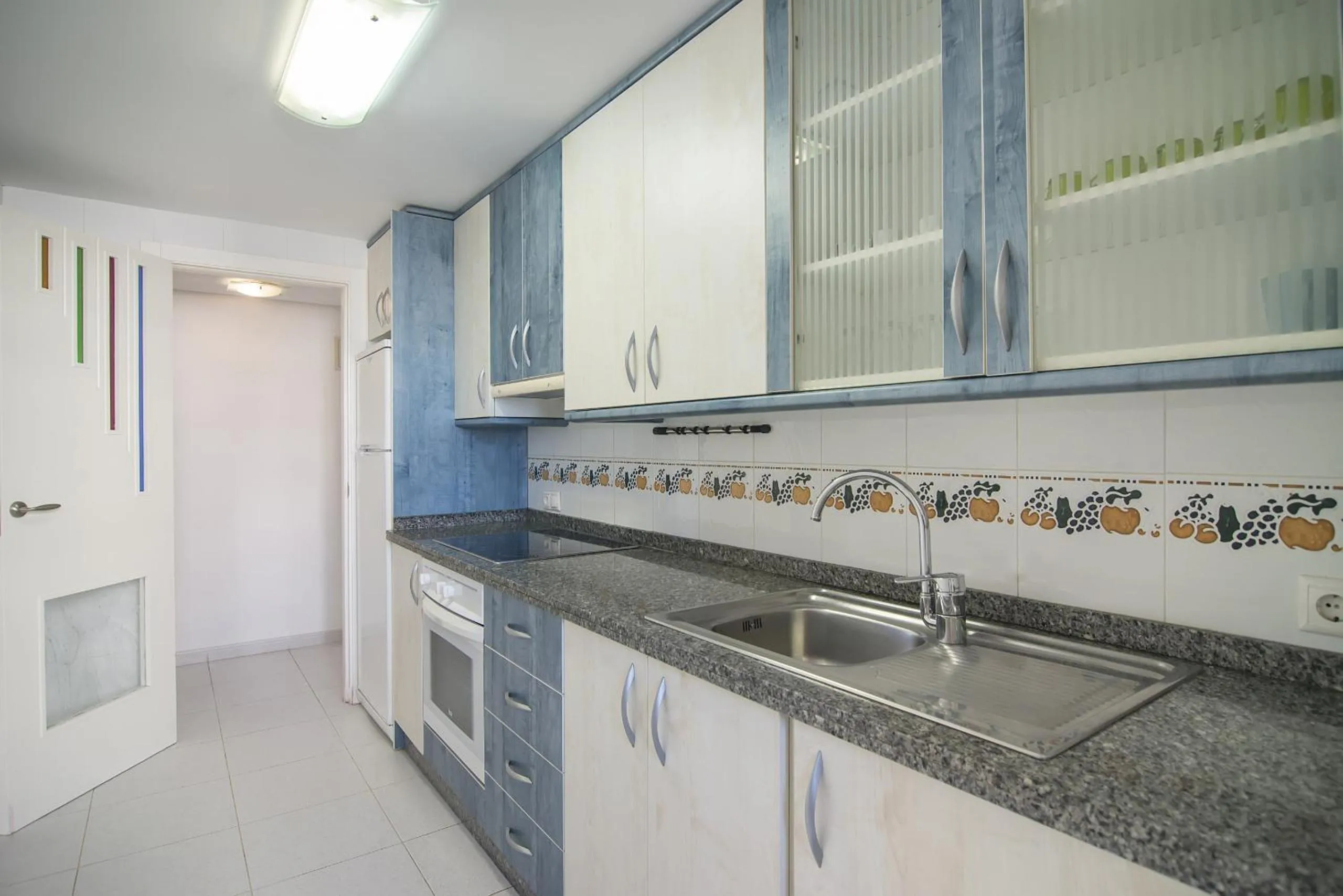 Kitchen or kitchenette in Apartamentos Hipocampos Calpe Rent Apart