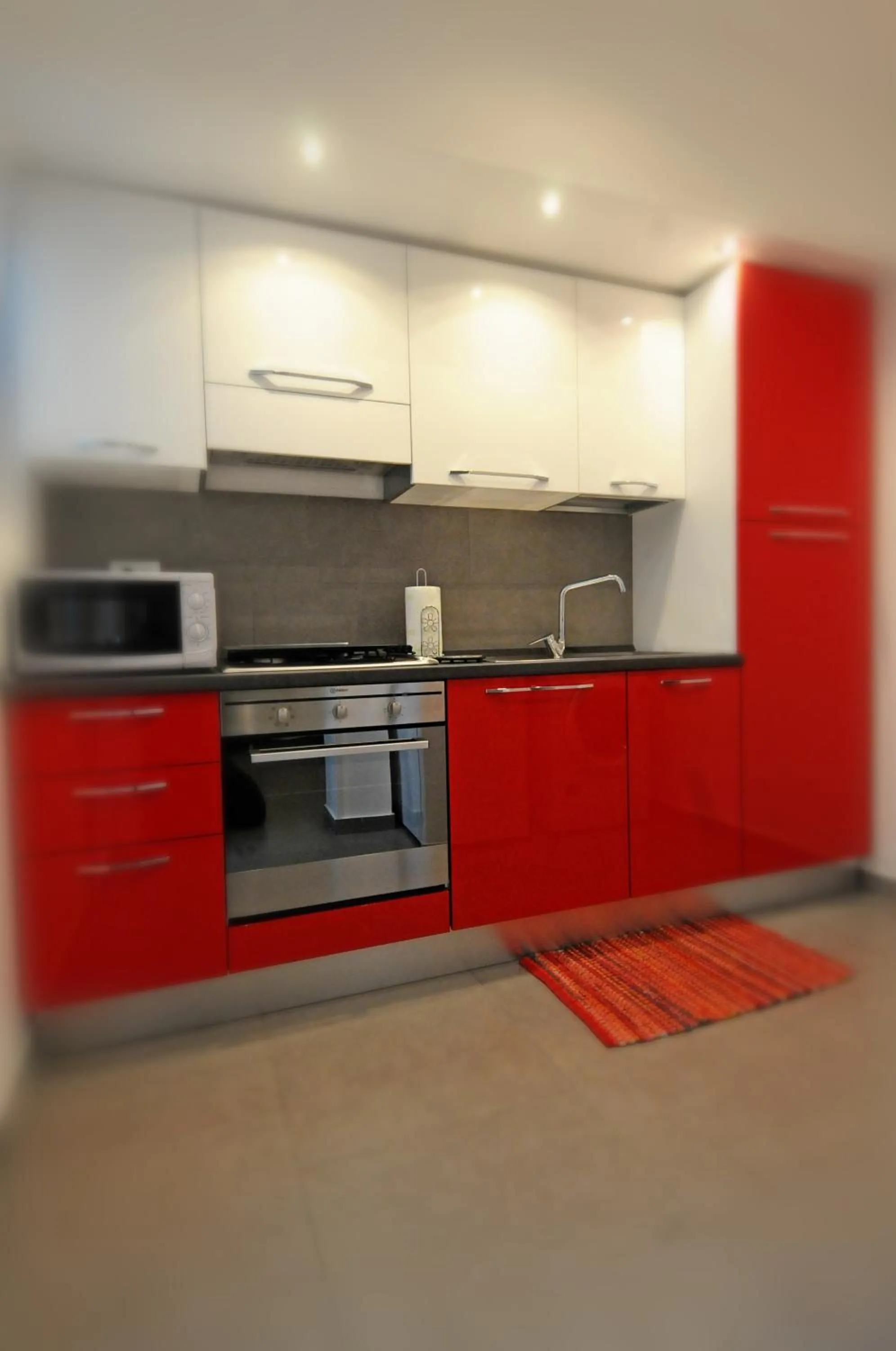 Communal kitchen in B&B Le Porte Del Centro