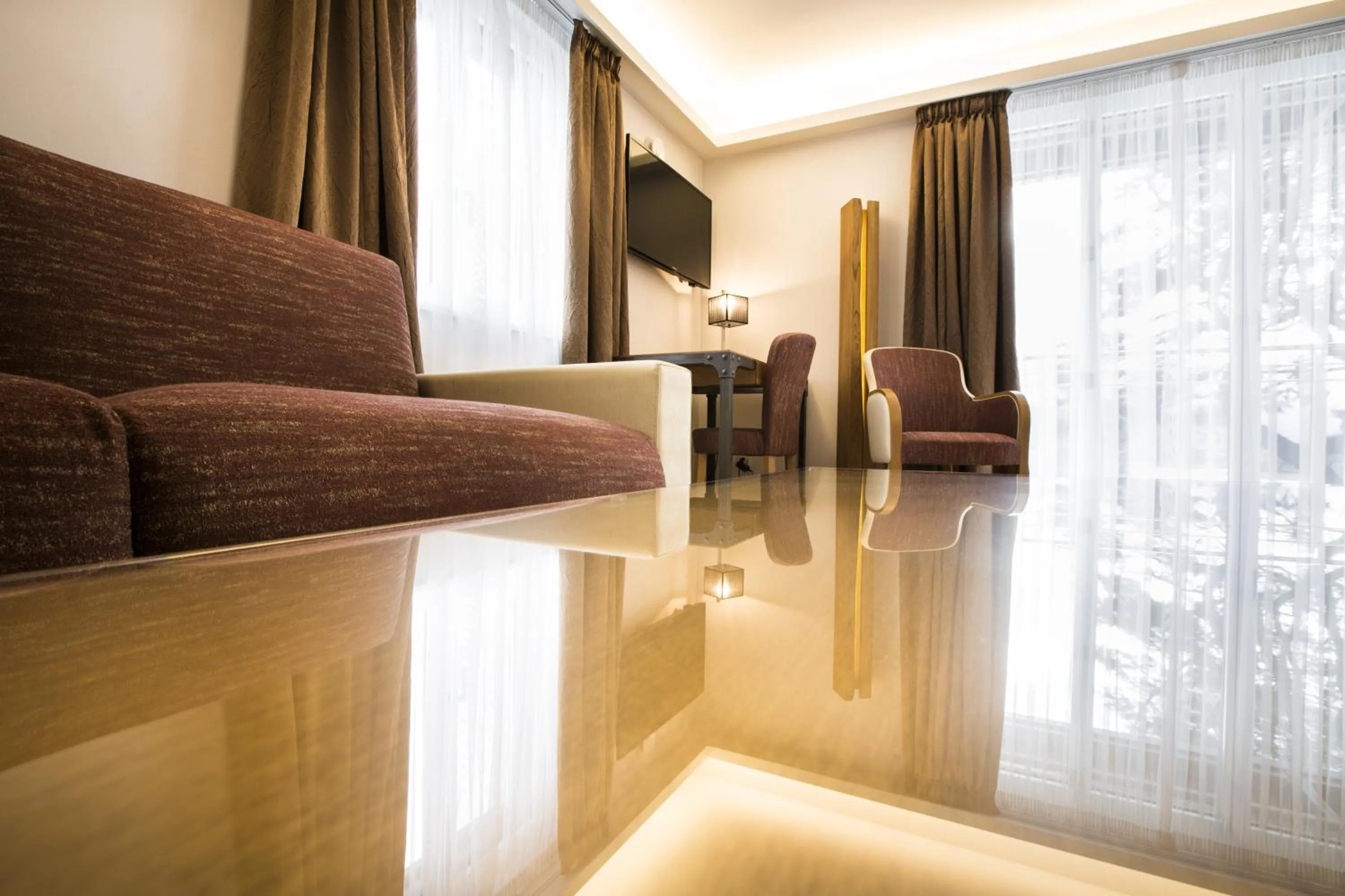 Seating area in Romantik Hotel le Vignier