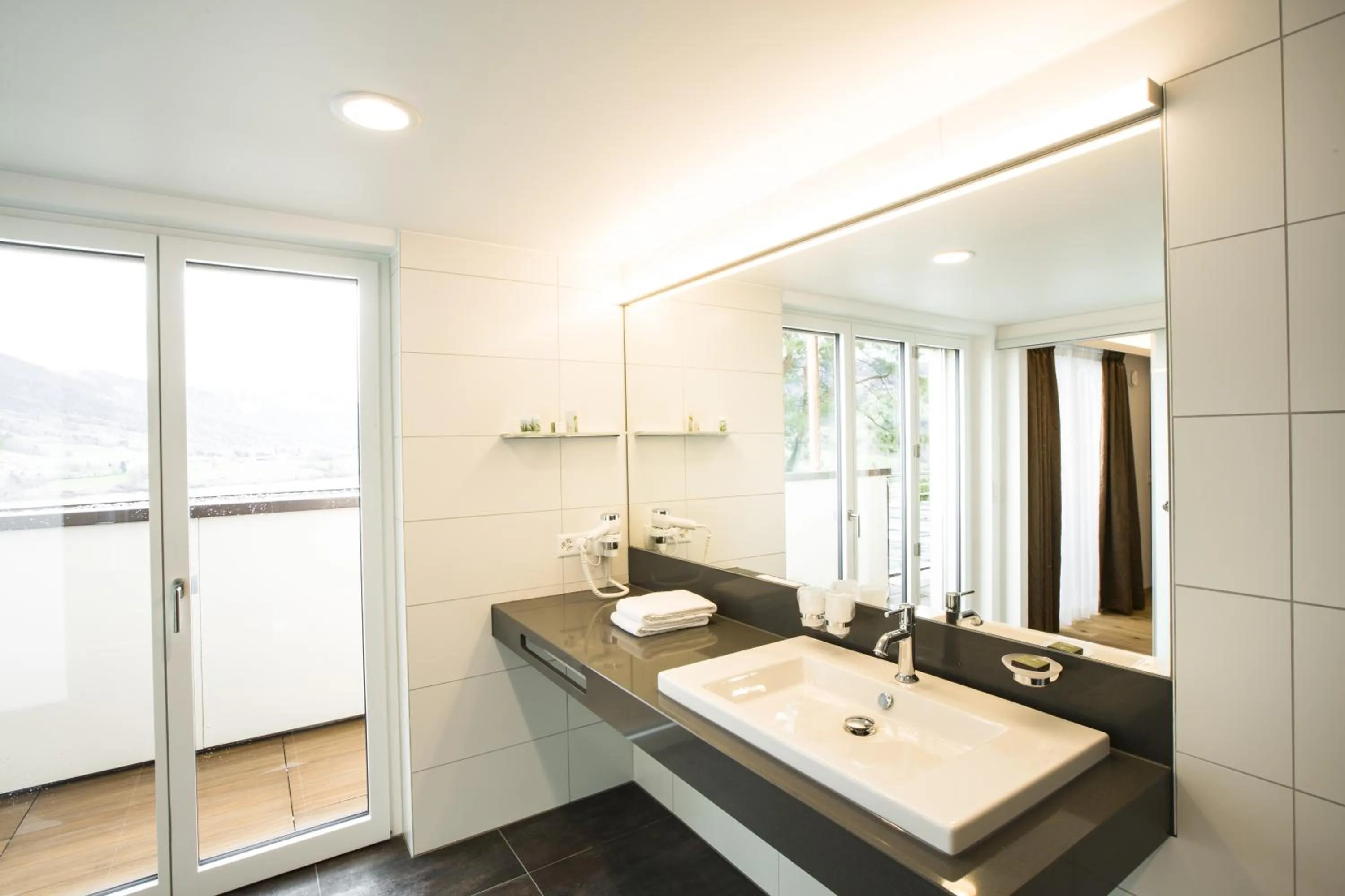 Bathroom in Romantik Hotel le Vignier