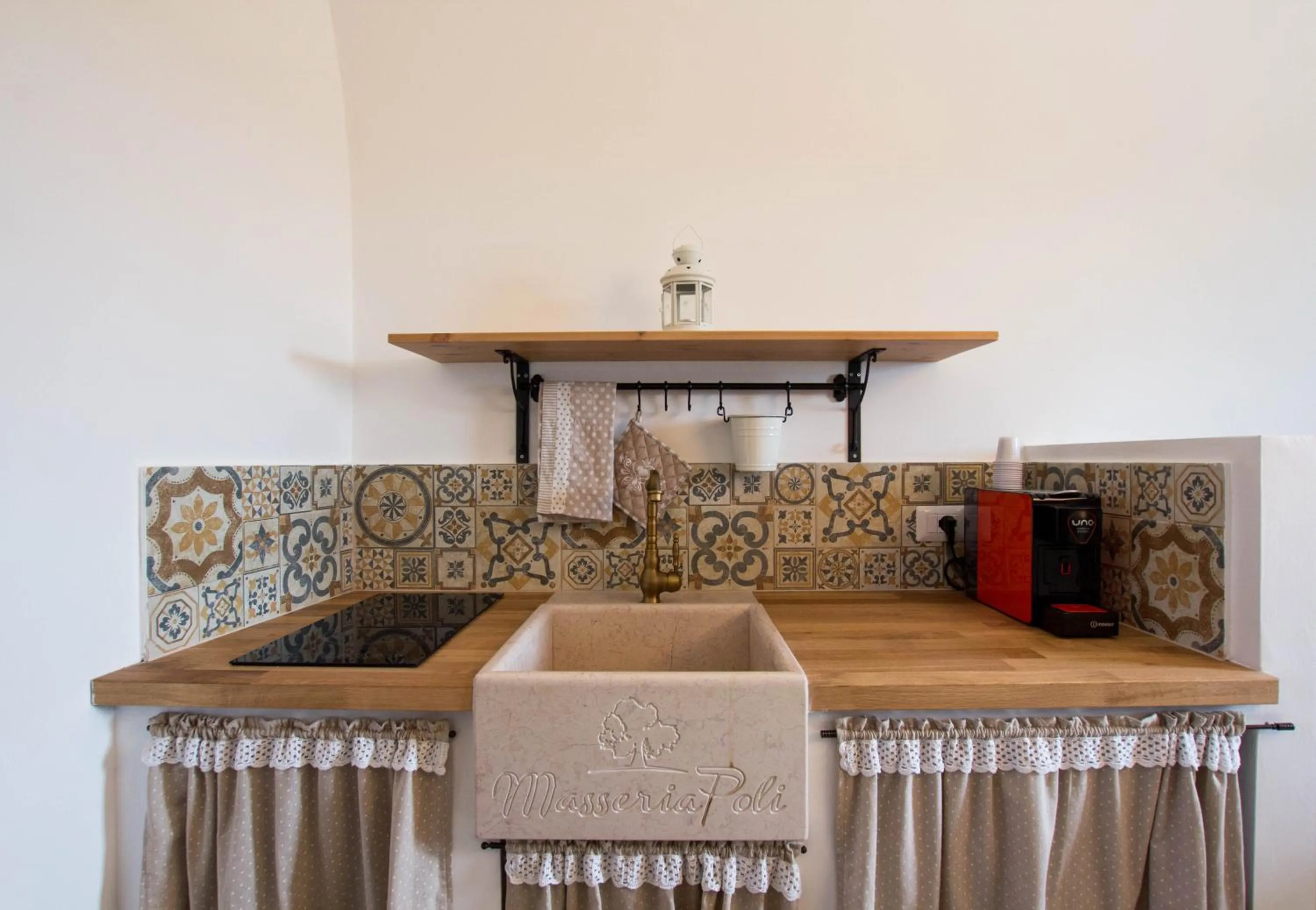 Kitchen or kitchenette in Masseria Poli Country House
