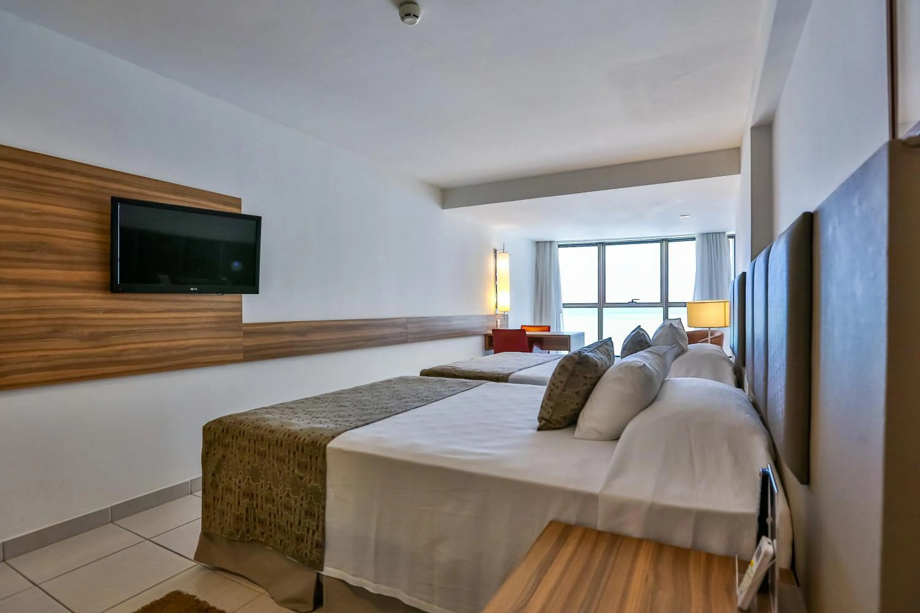 Photo of the whole room, Bed in Flat Beach Class Executive