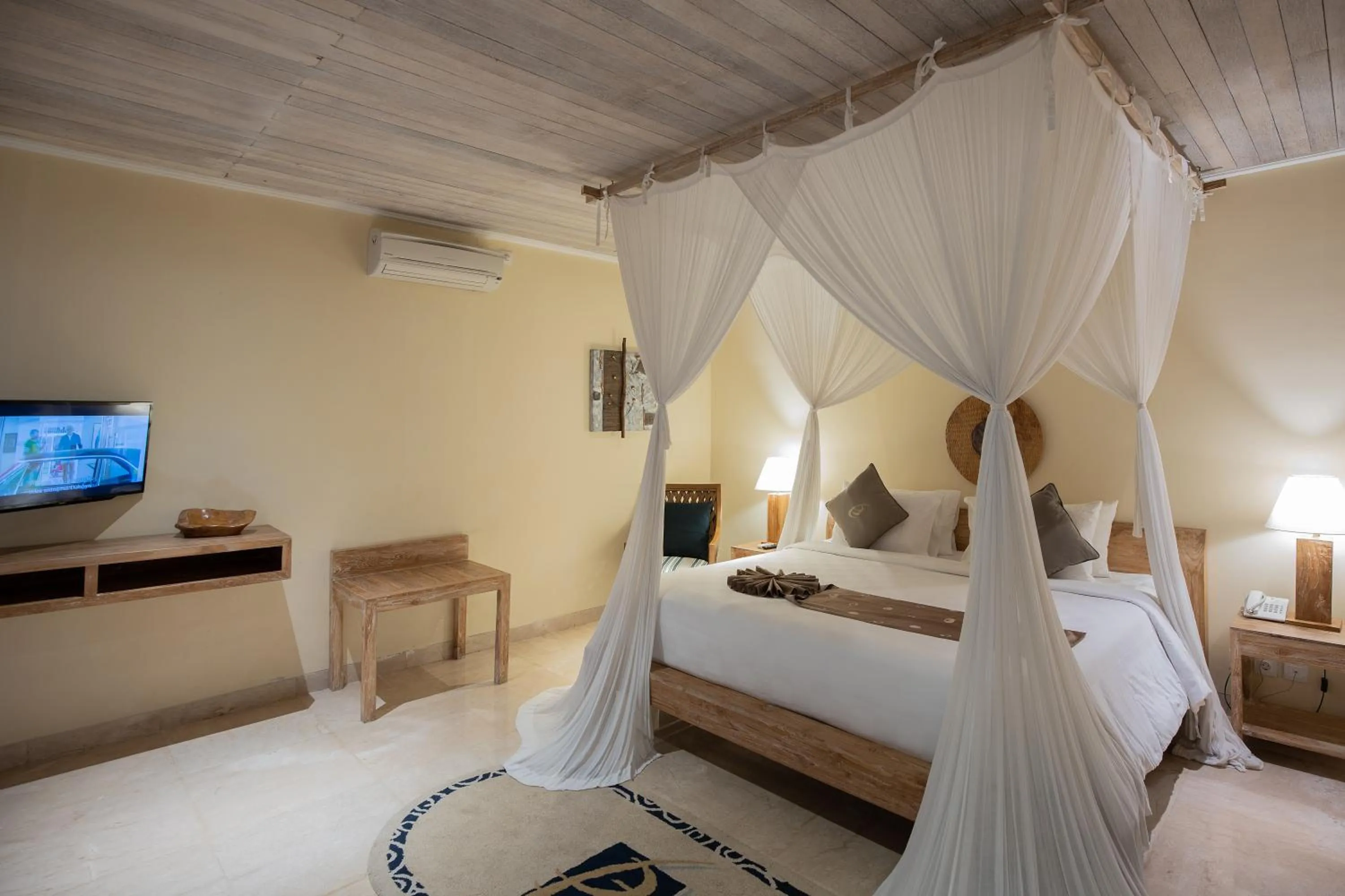 Bedroom, Bed in La Berceuse Resort and Villa Nusa Dua by Taritiya Collection