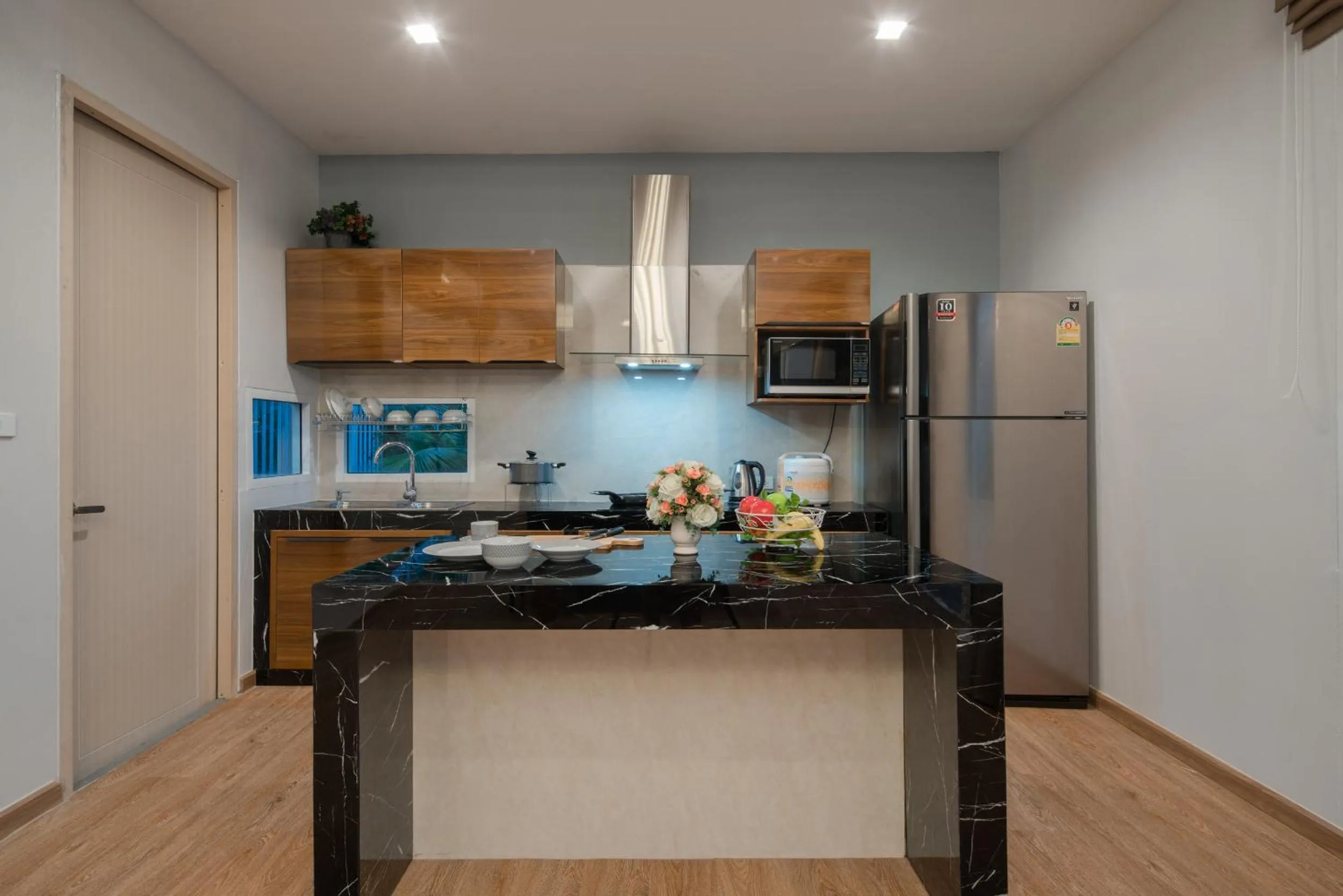 Kitchen or kitchenette in The Orchid Villa