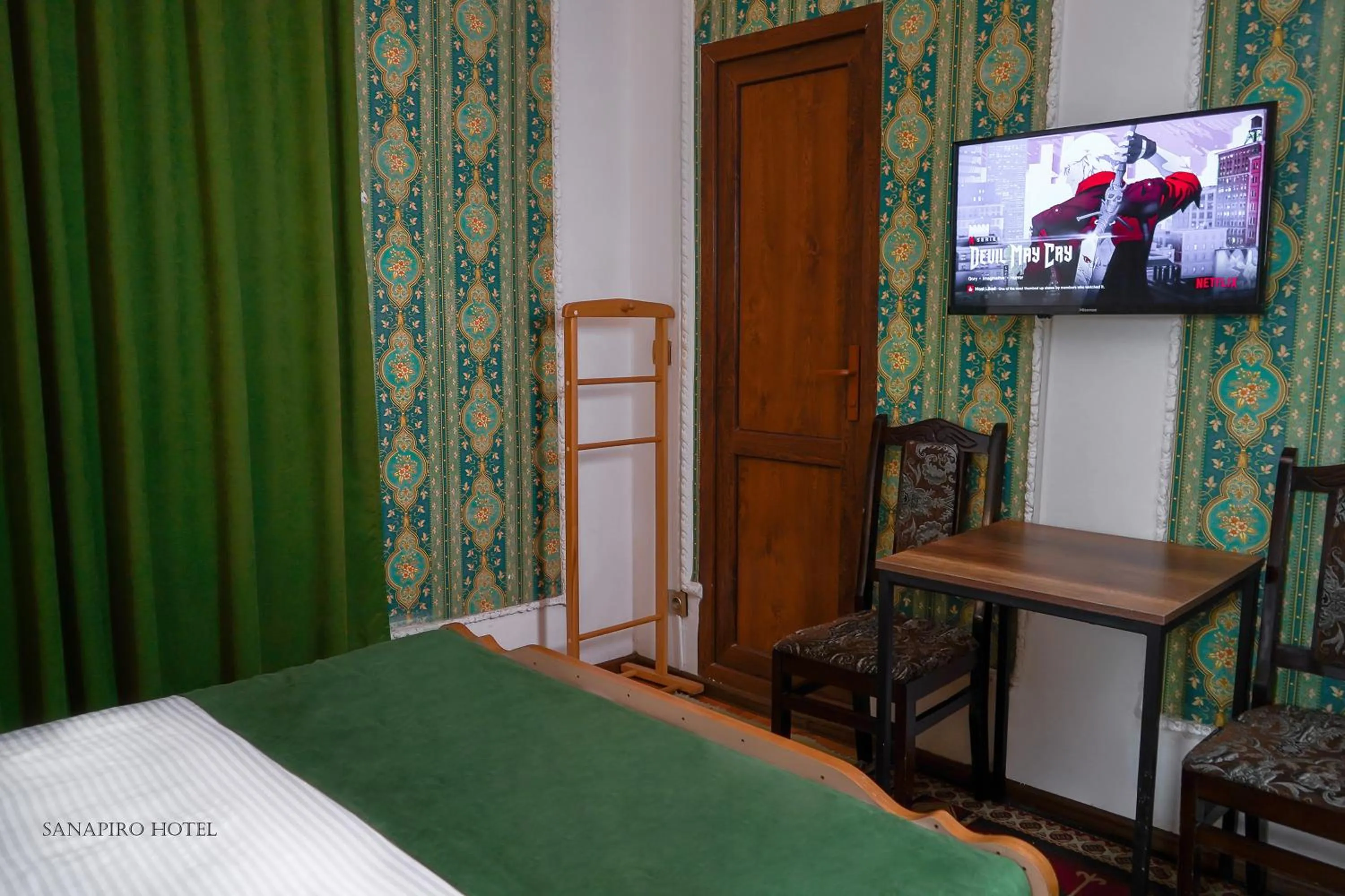 Bed in Sanapiro Hotel