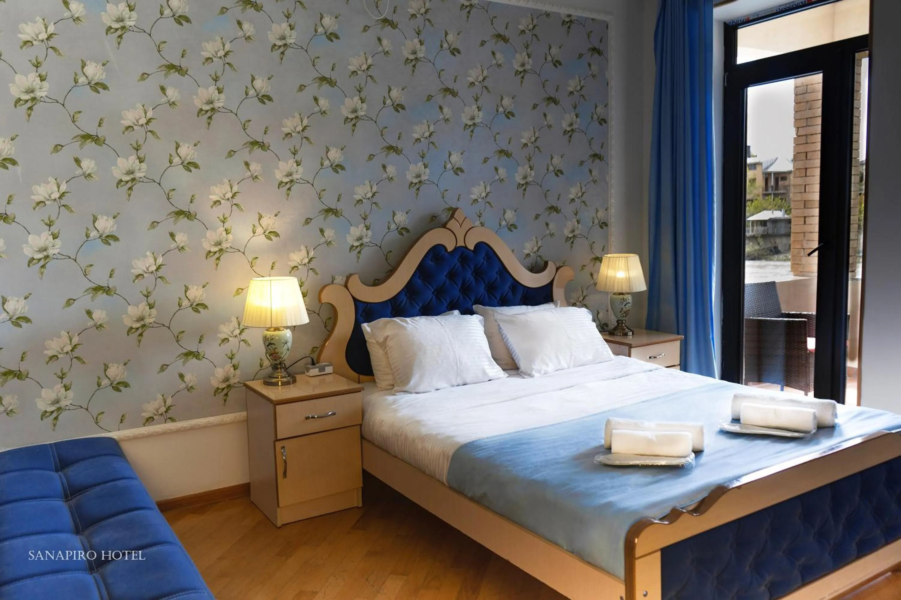 River view, Bed in Sanapiro Hotel