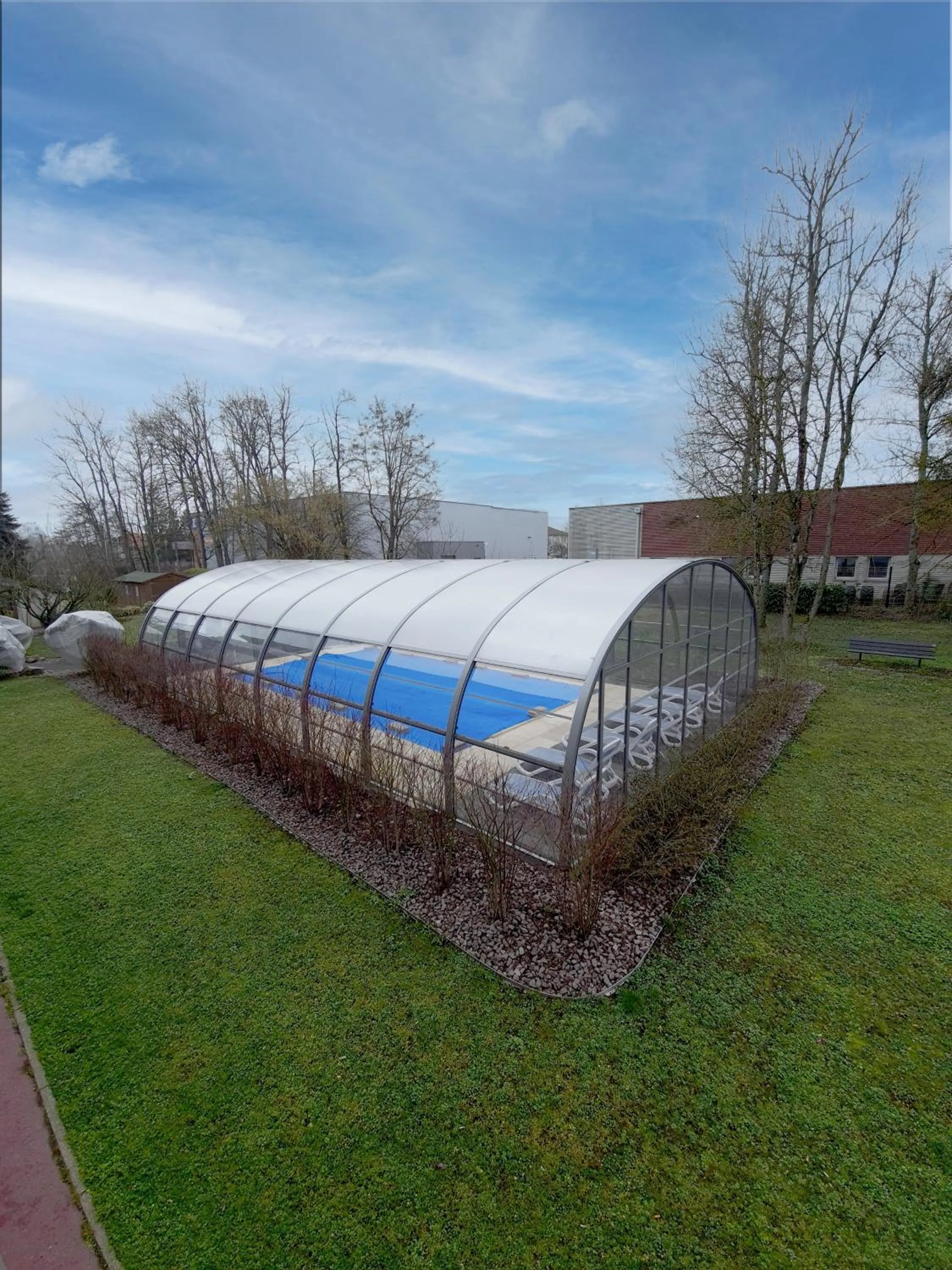 Swimming pool in Brit Hotel Confort Nancy Lunéville