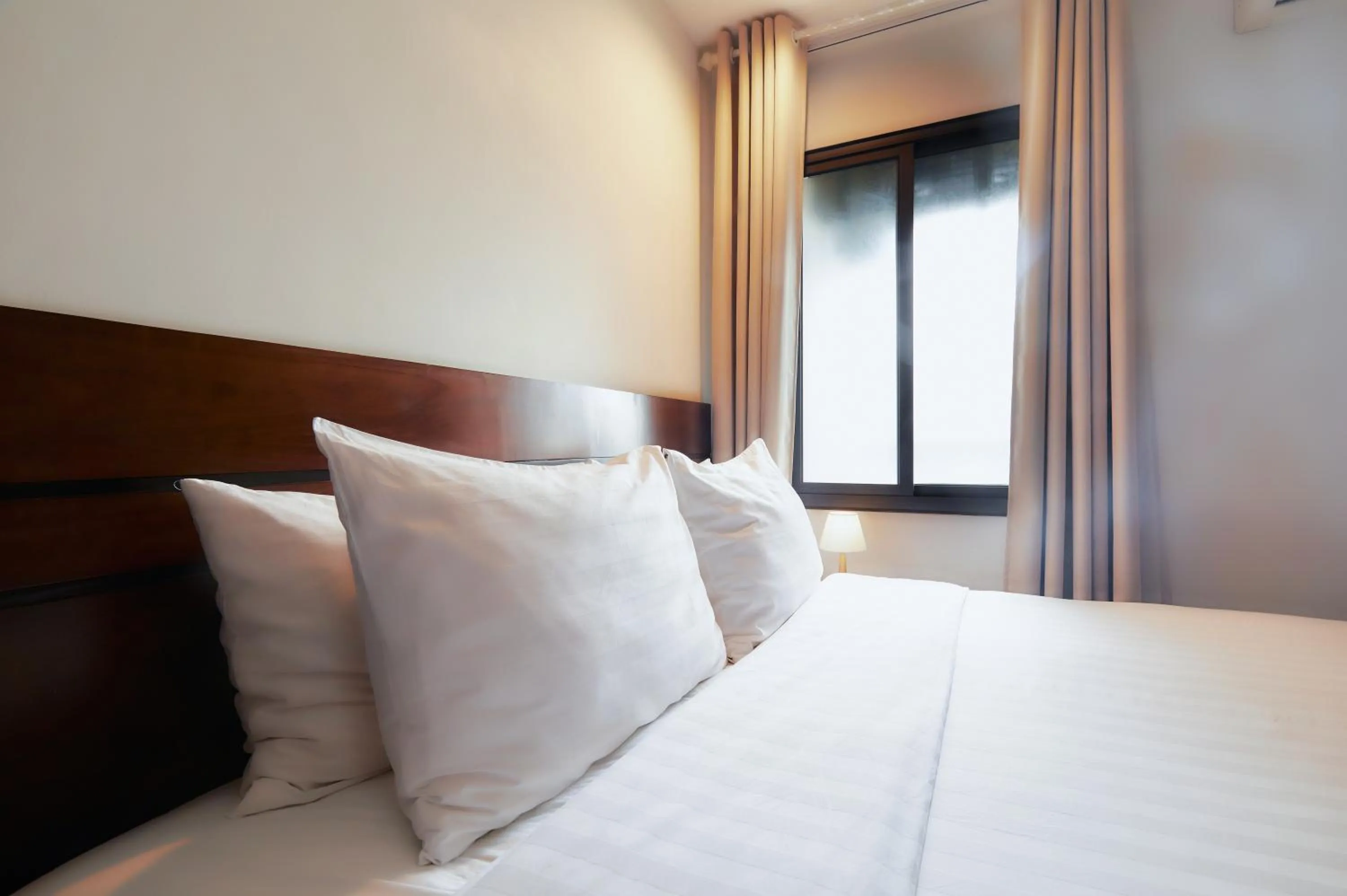 Bed in The Bloom Classic - An Excellent Blend of Cozy Living and Urban Relaxation