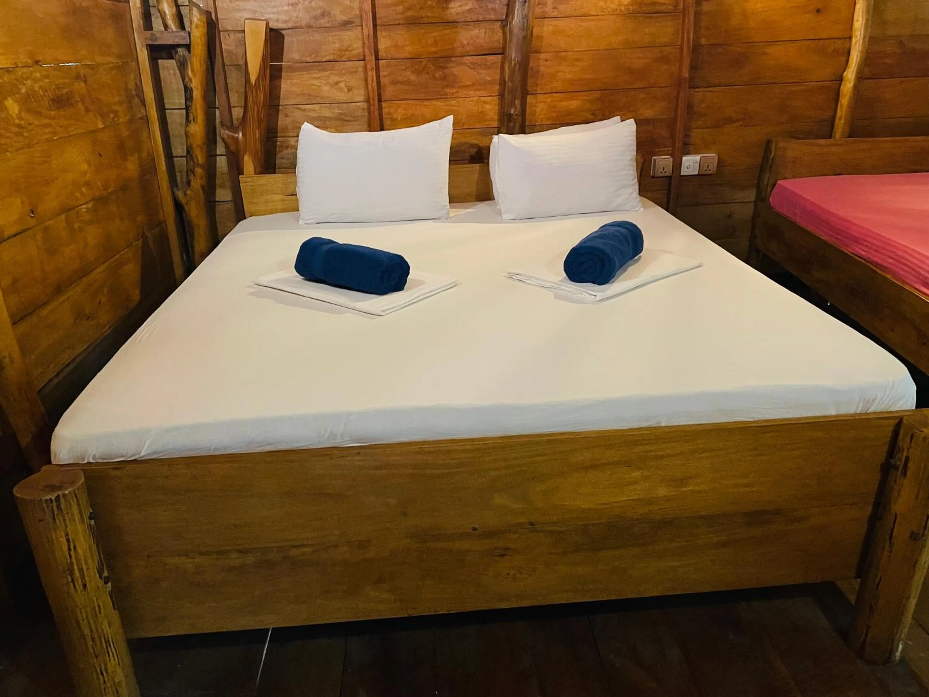 Bed in LakeSide Cabana Tissamaharama