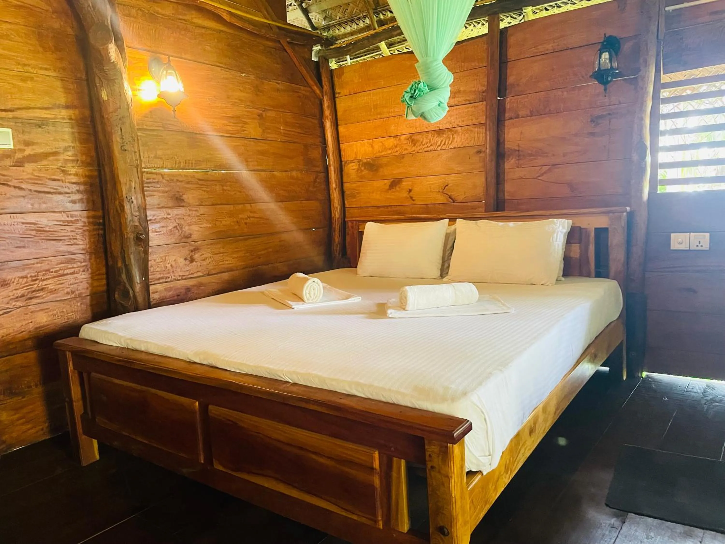 Bed in LakeSide Cabana Tissamaharama