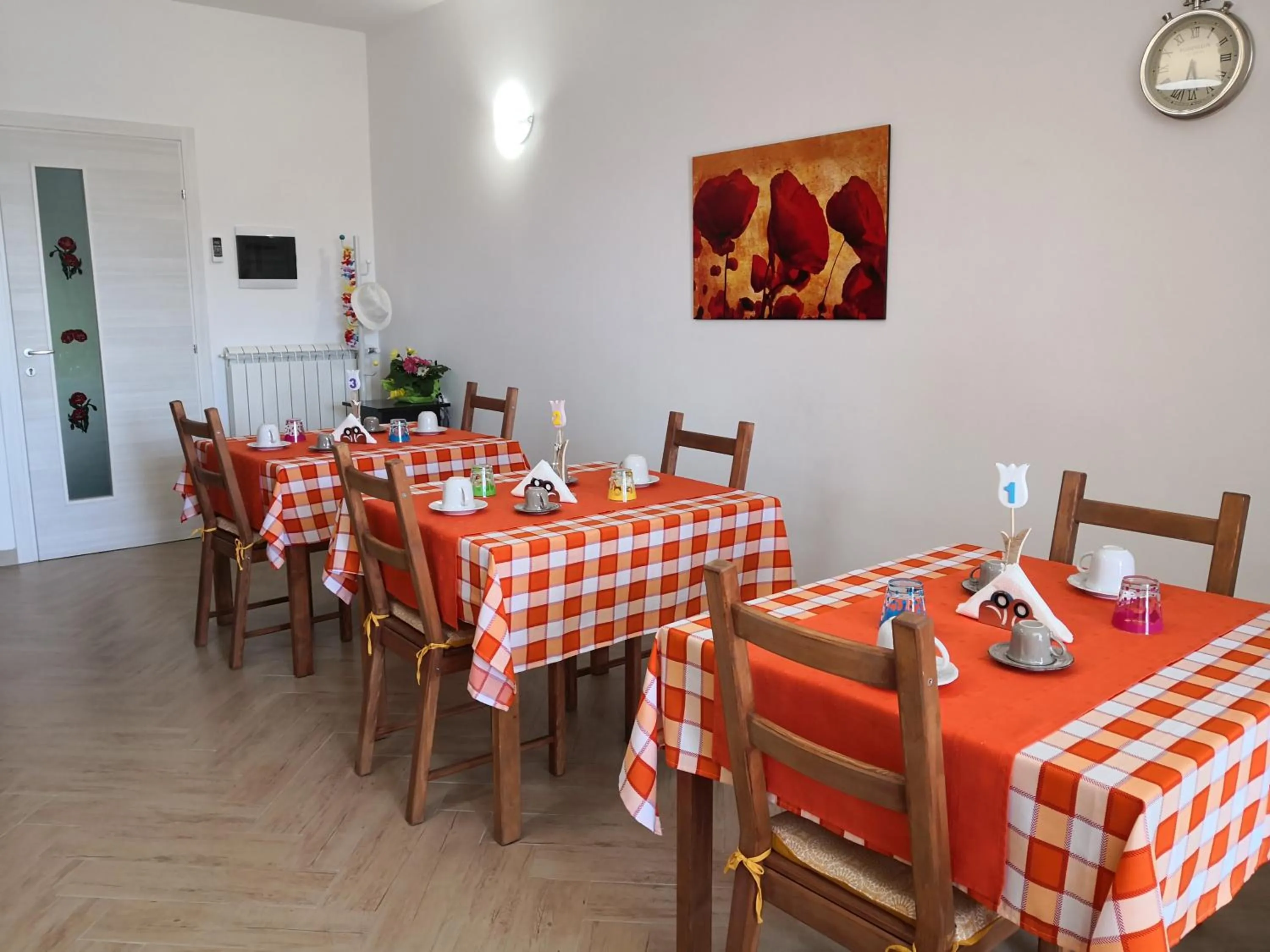 Communal lounge/ TV room in B&B Il Papavero Rosso