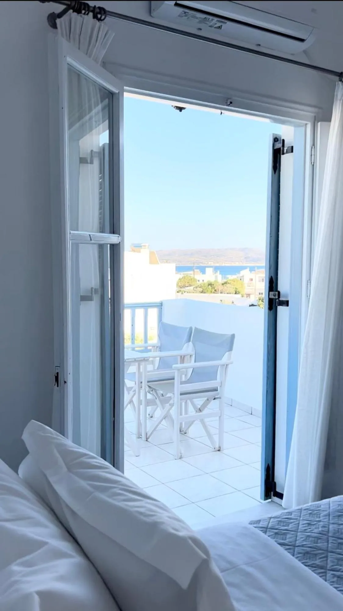 Balcony/Terrace, Bed in Anita Rooms & Suites Milos