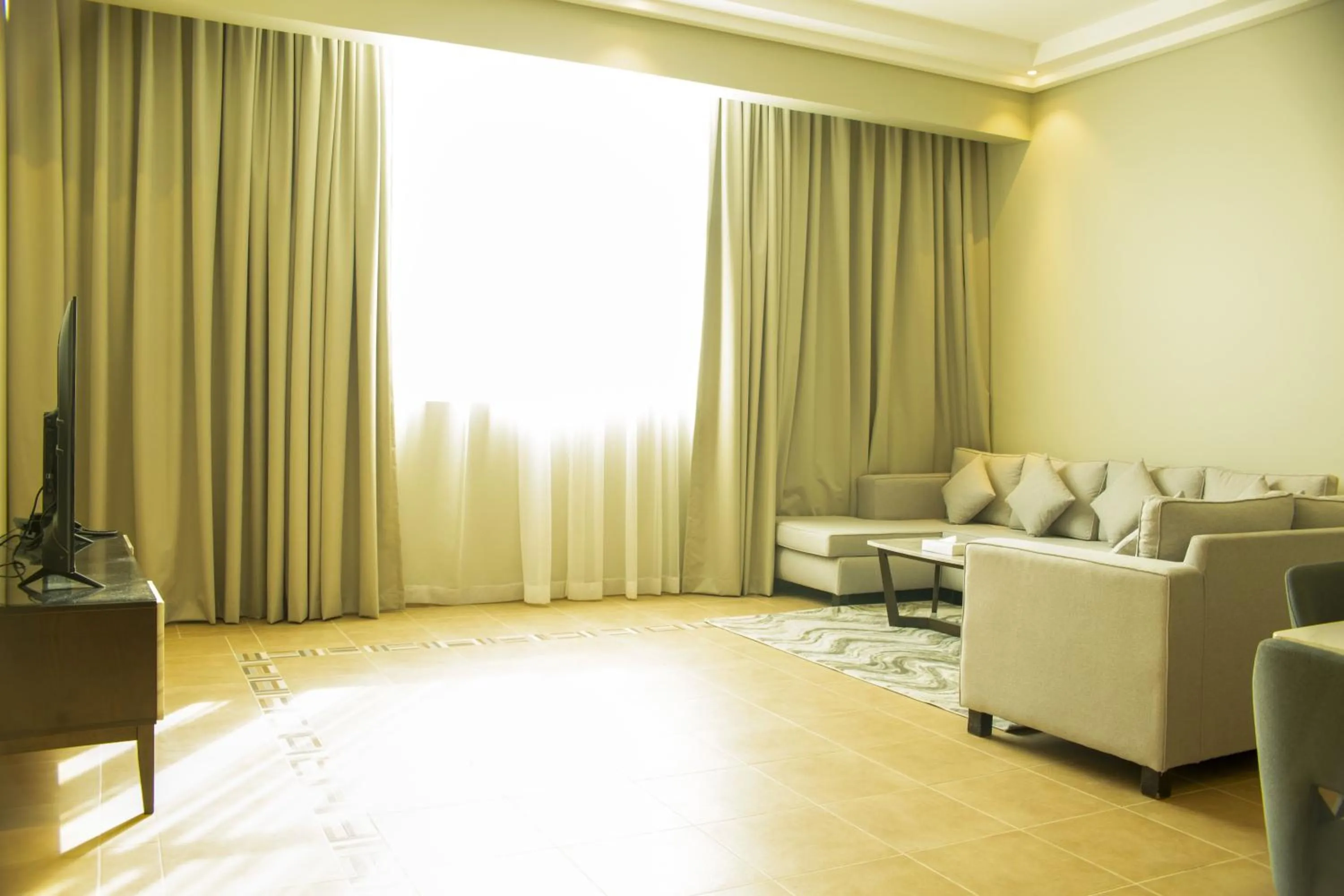 Seating area in Infinity Tower Suites WLL