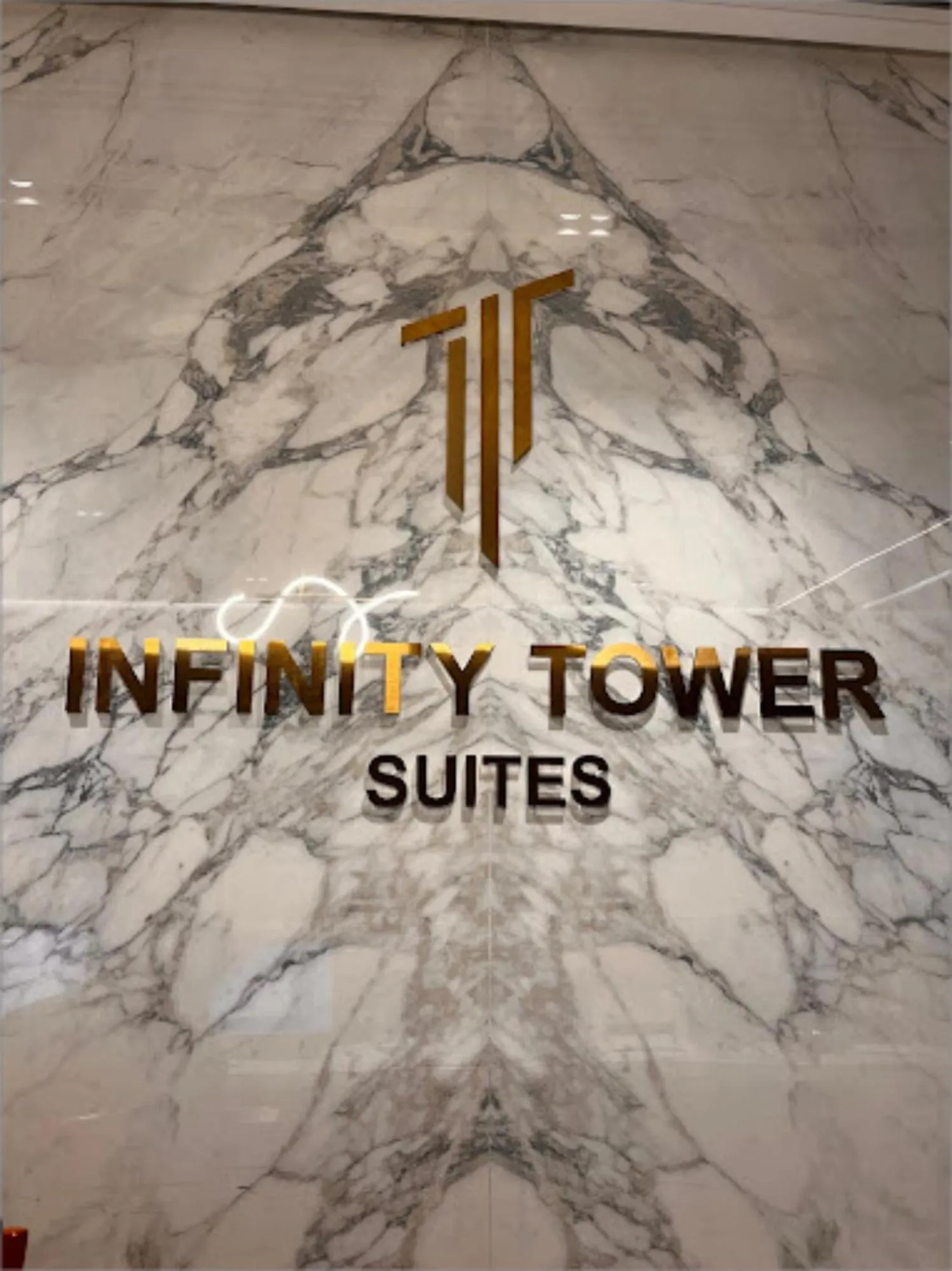 Logo/Certificate/Sign in Infinity Tower Suites WLL