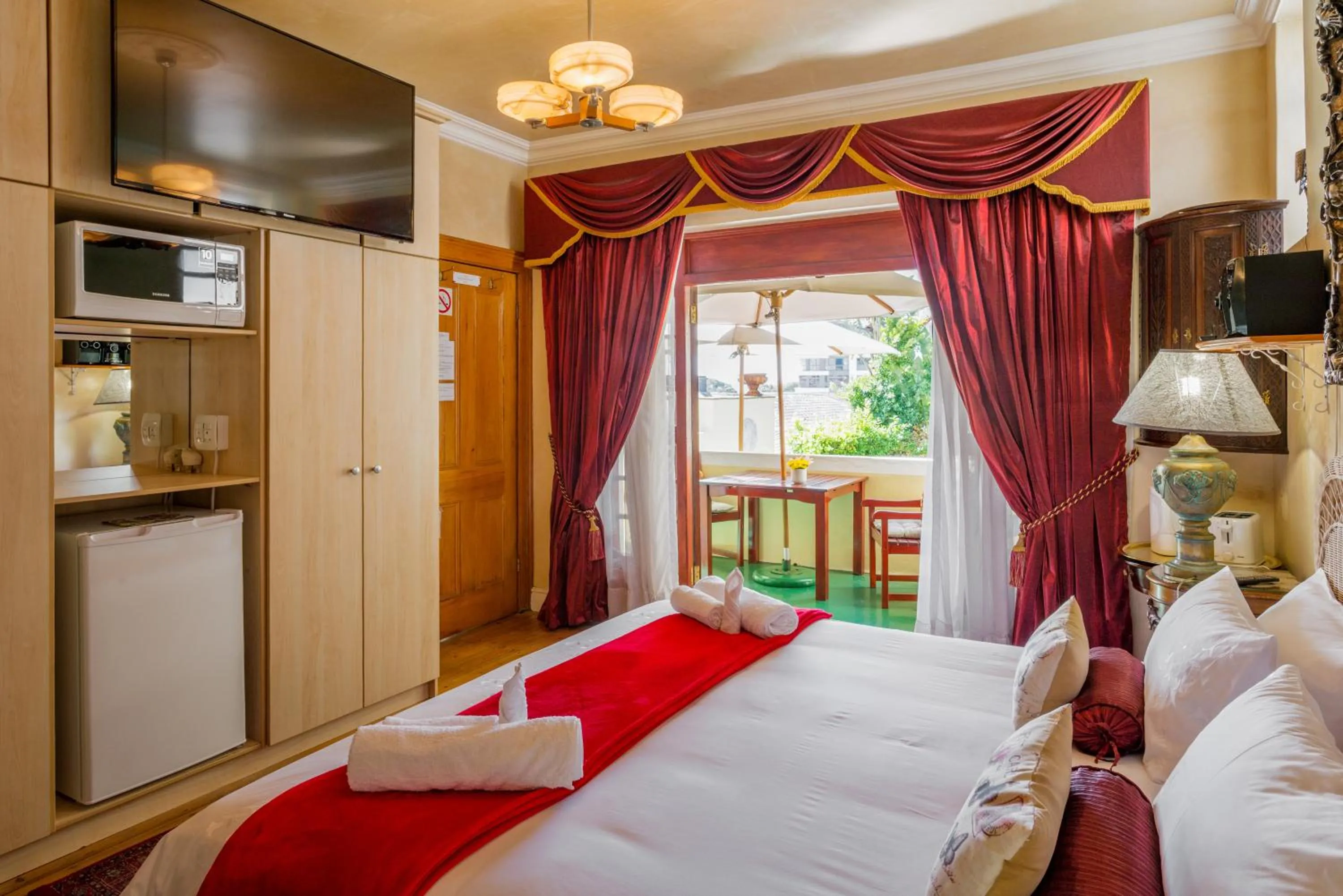 Photo of the whole room, Bed in Stadium Guest House