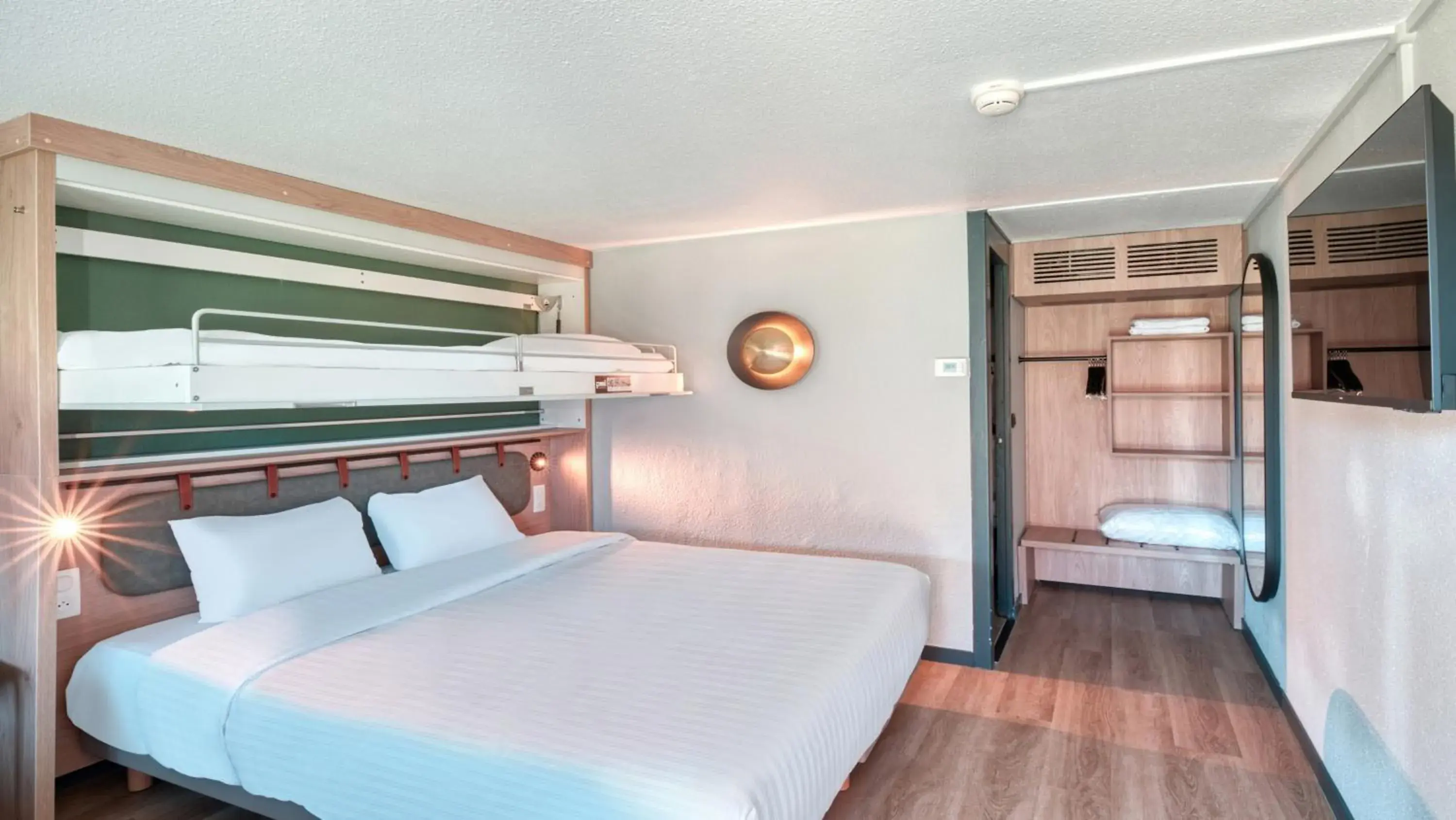 Standard Queen Room with One Bunk Bed in Campanile Bayonne Standard Queen Room with One Bunk Bed in Campanile Bayonne