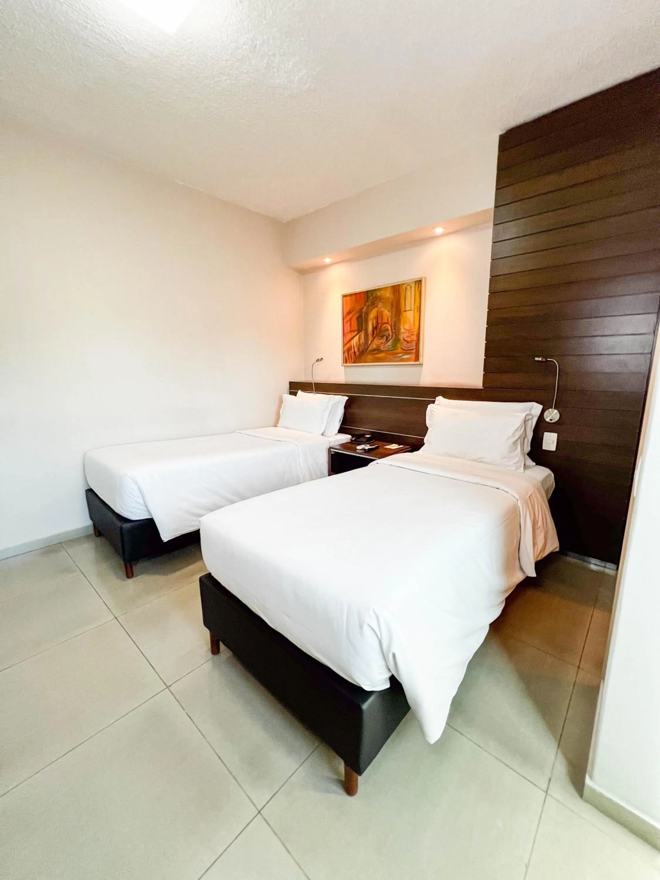 Bed in Royal Center Hotel Lourdes