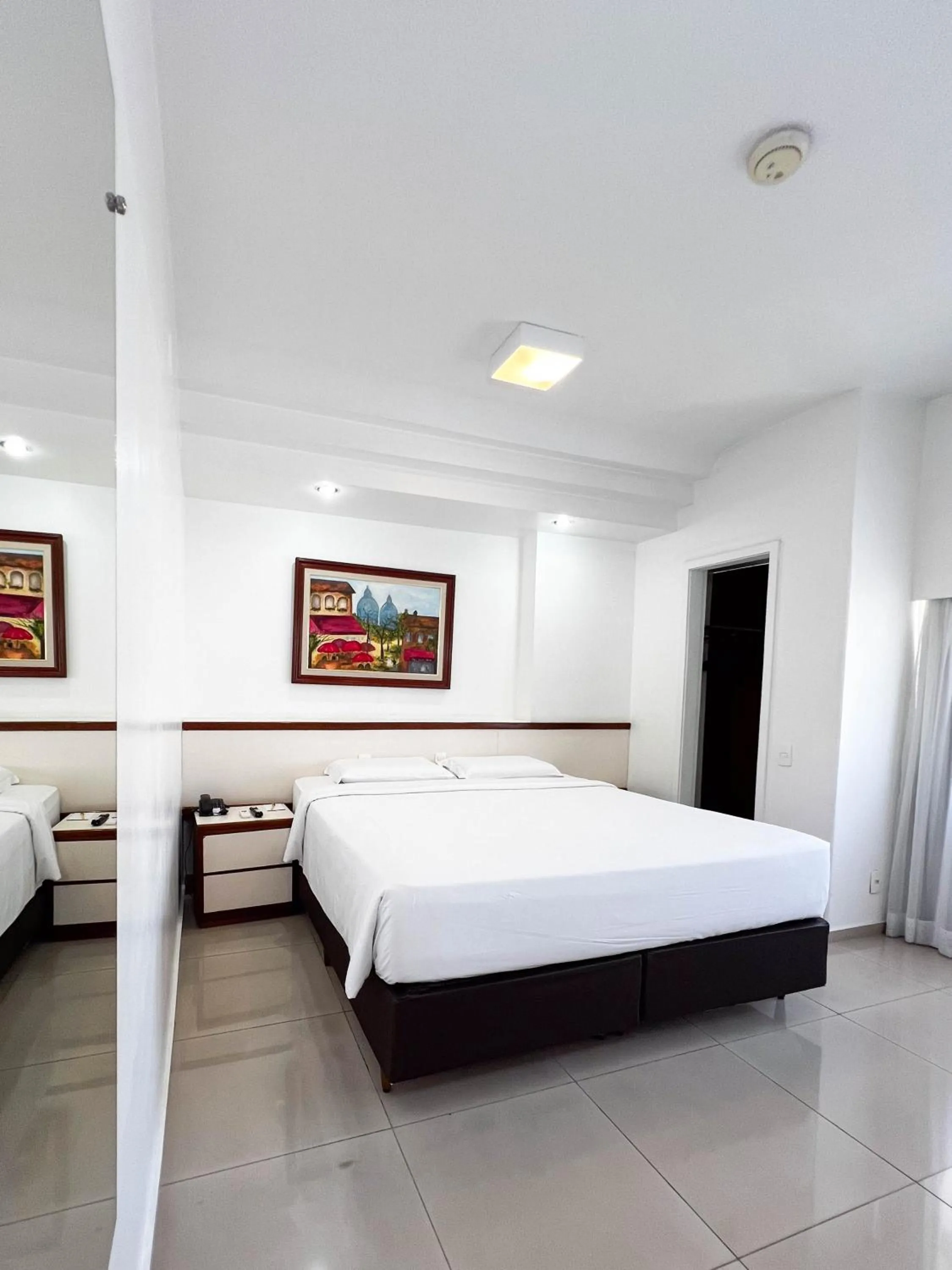 Bed in Royal Center Hotel Lourdes