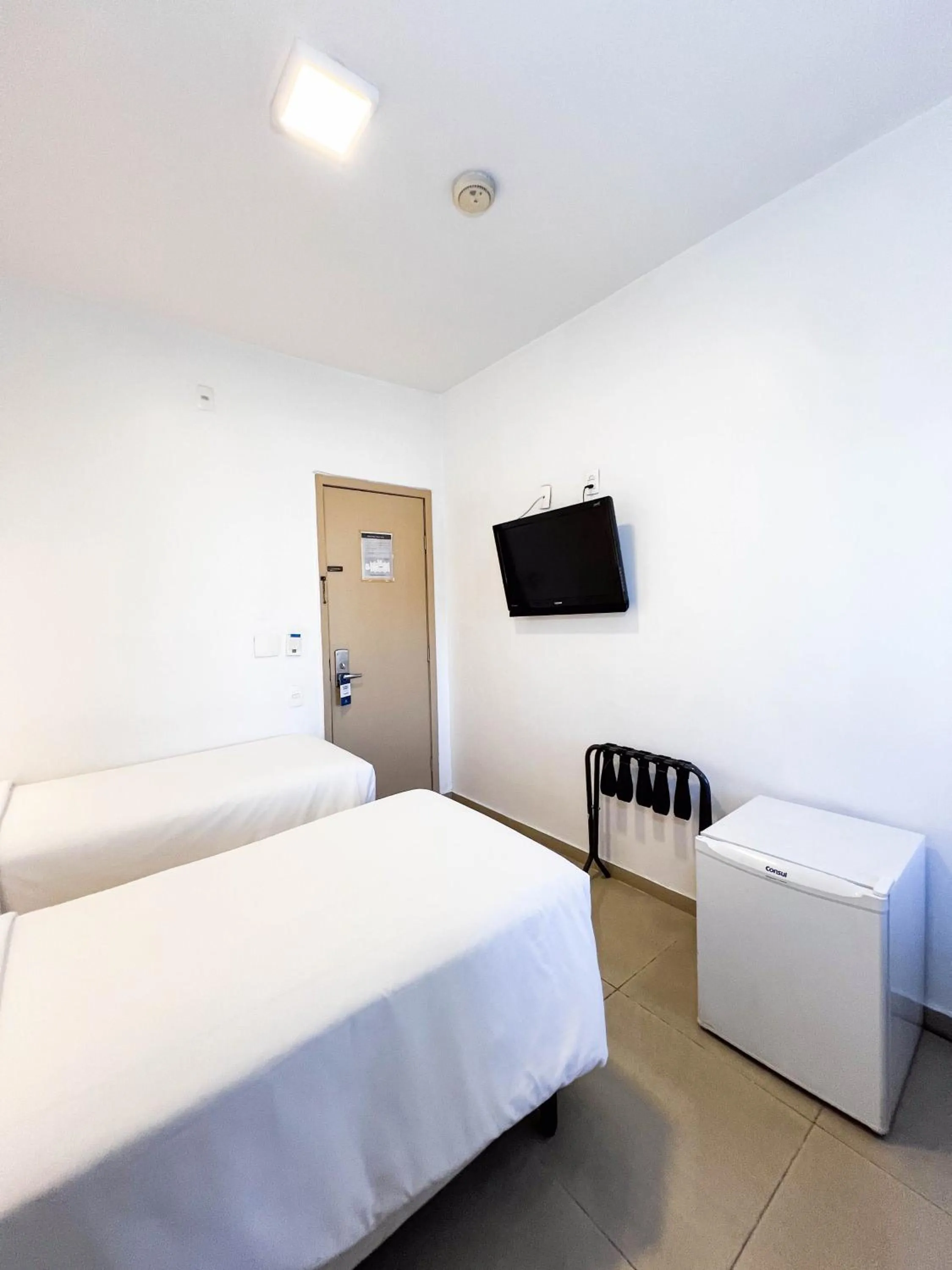 Bed in Royal Center Hotel Lourdes