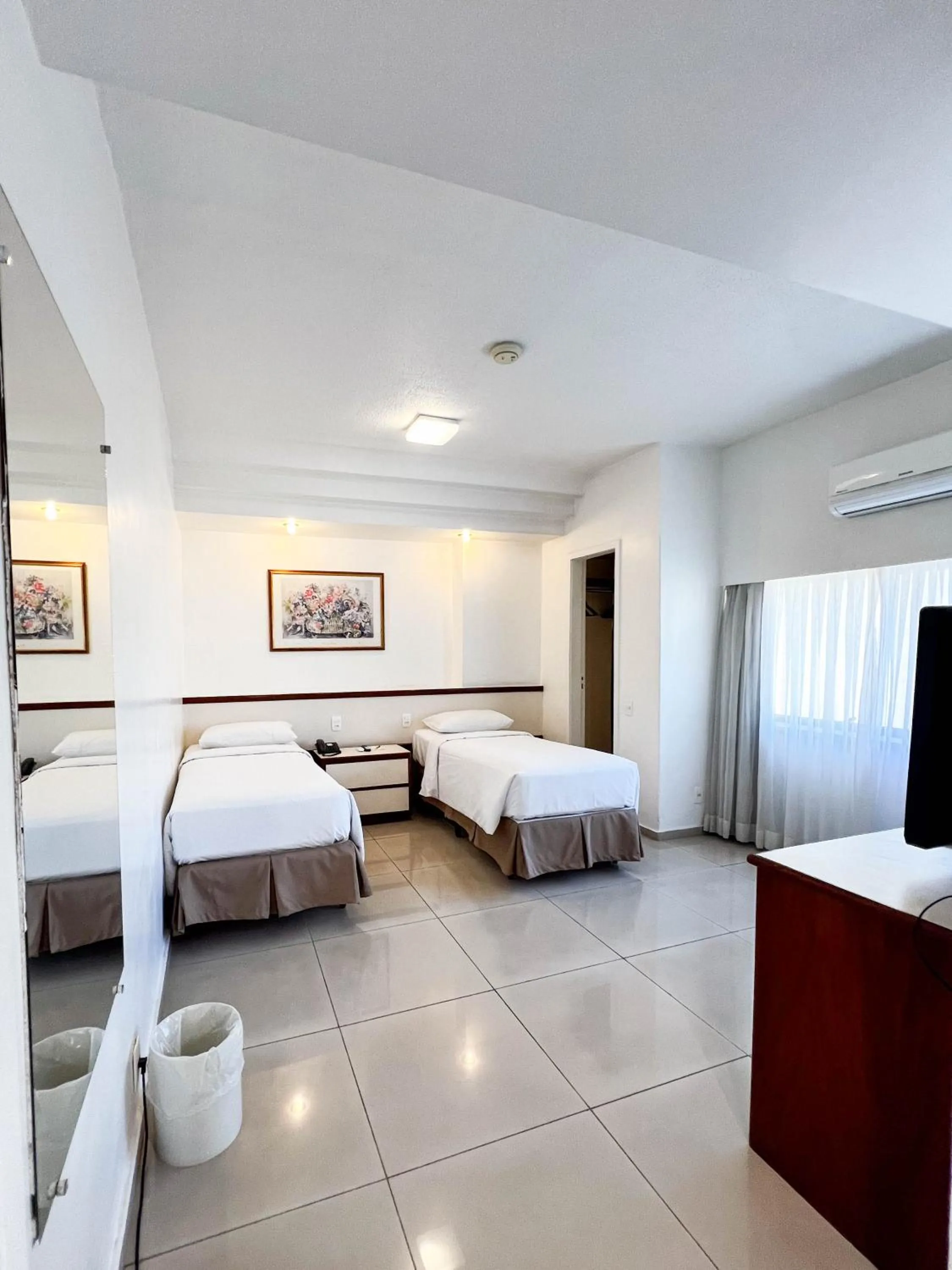 Bed in Royal Center Hotel Lourdes