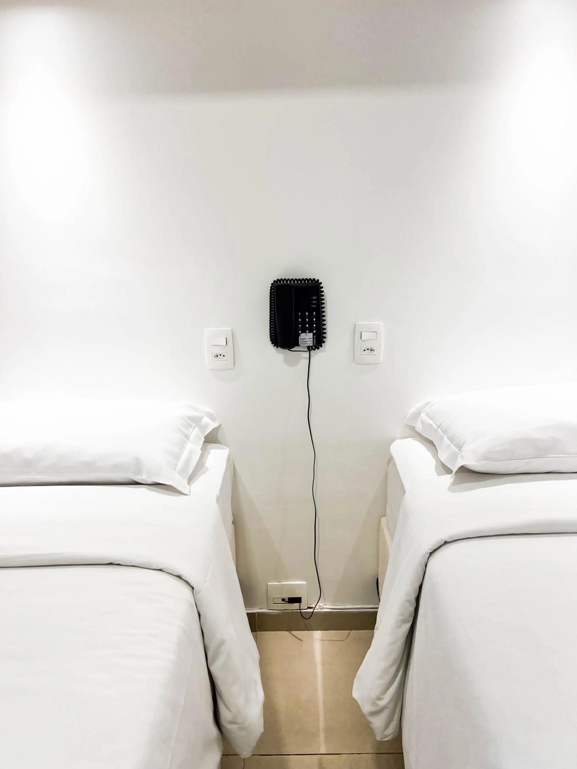 Bed in Royal Center Hotel Lourdes