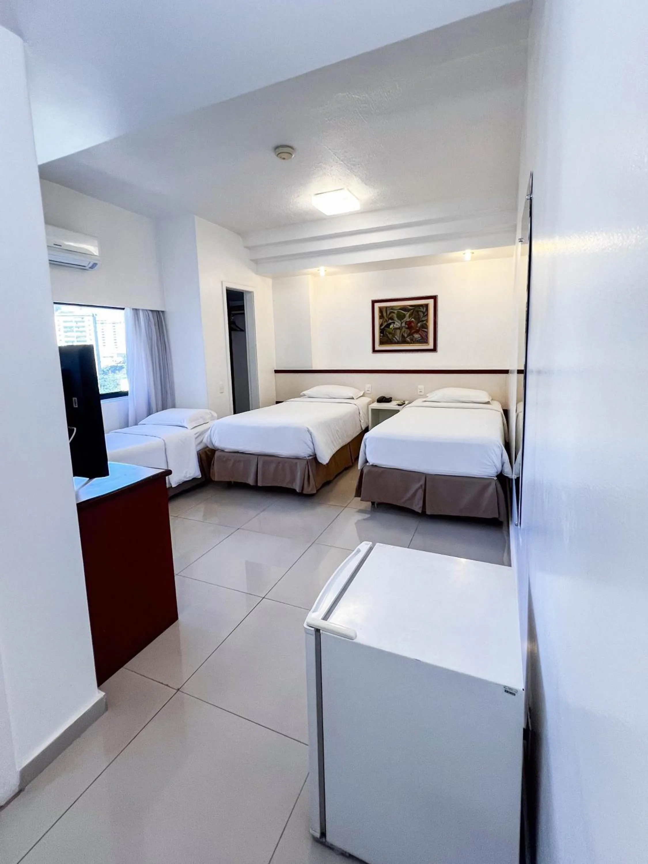 Bed in Royal Center Hotel Lourdes