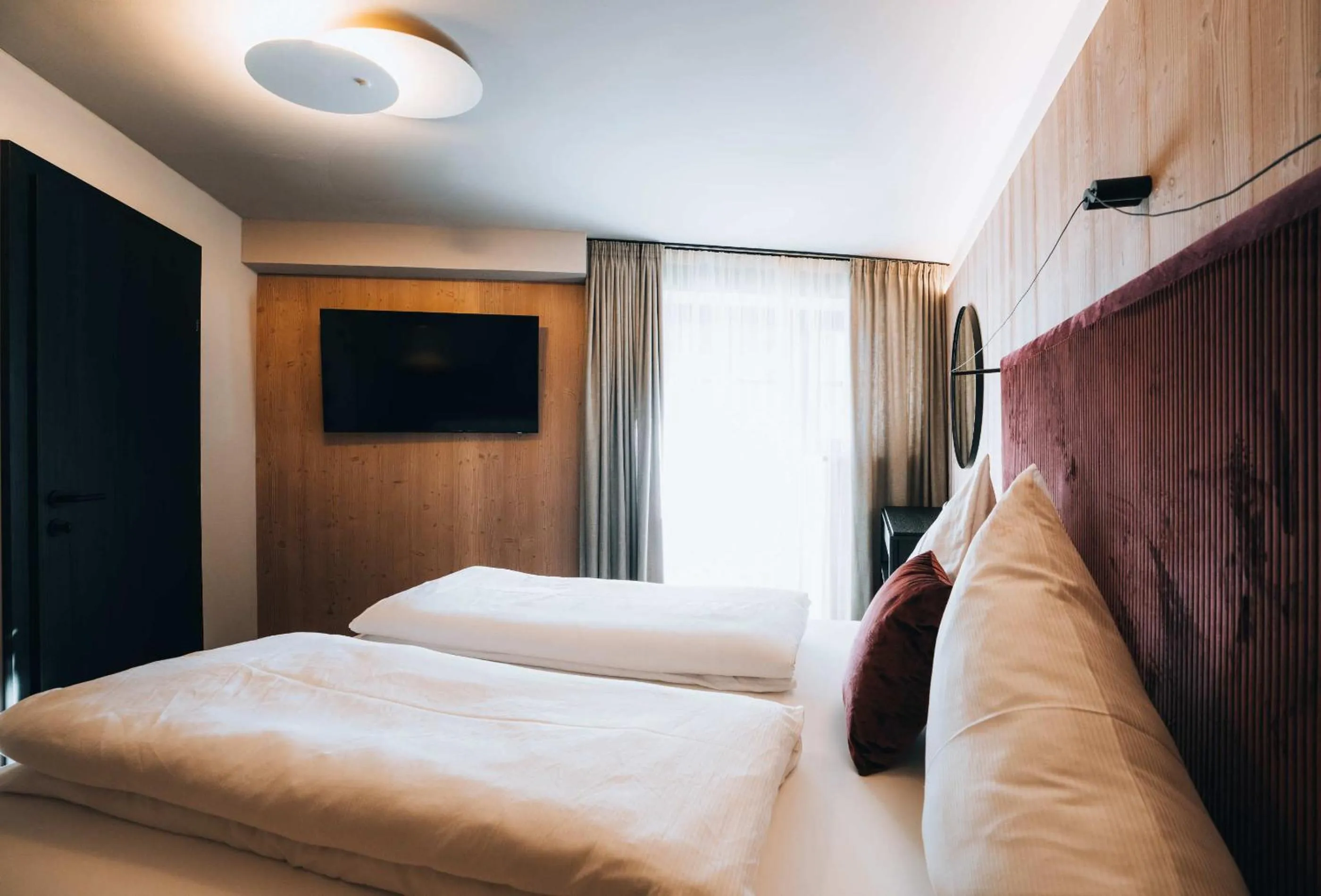 Communal lounge/ TV room, Bed in Grünwald Resort Sölden