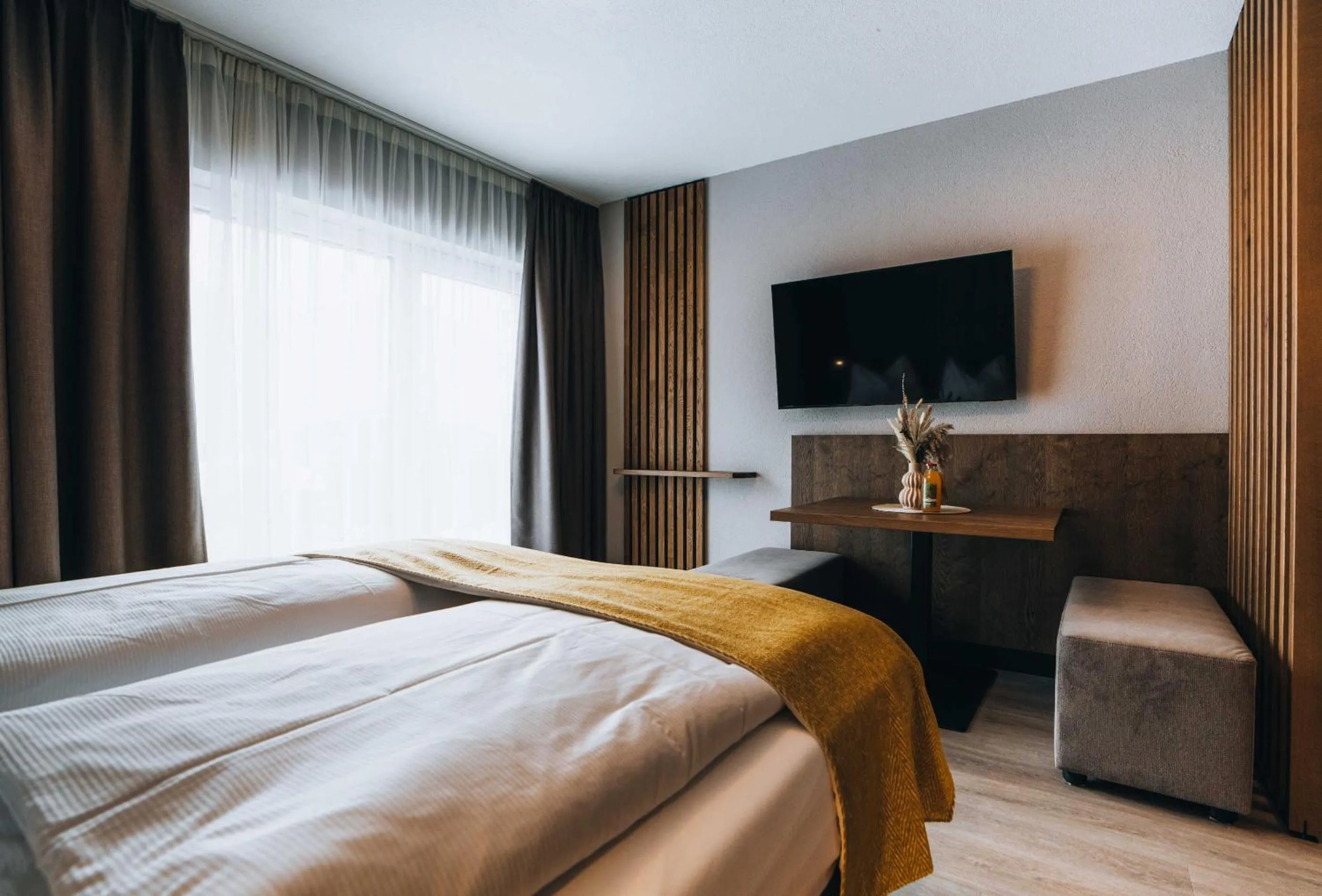 Communal lounge/ TV room, Bed in Grünwald Resort Sölden