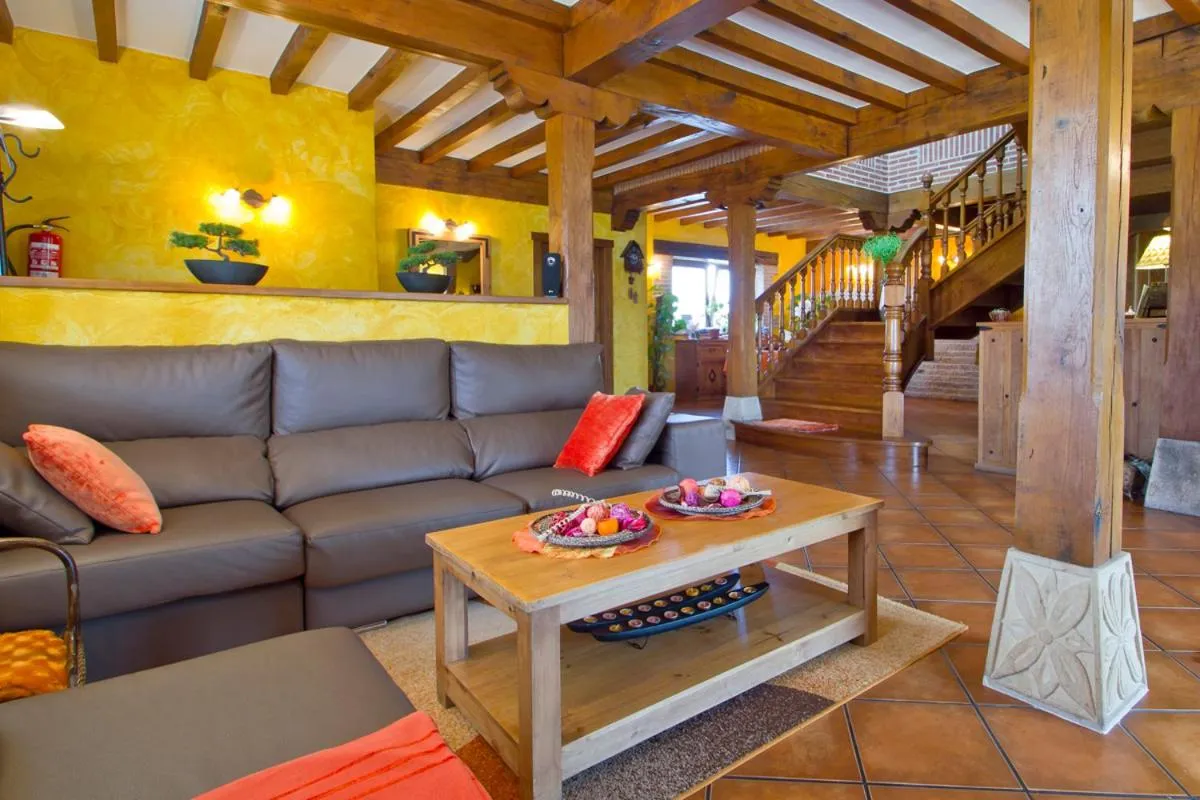 Communal lounge/ TV room in Posada La Fabula