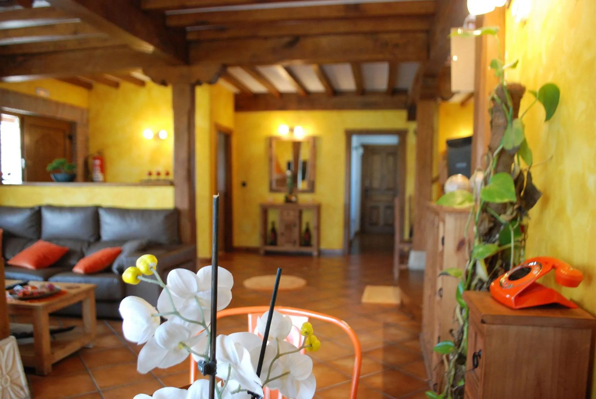 Communal lounge/ TV room in Posada La Fabula