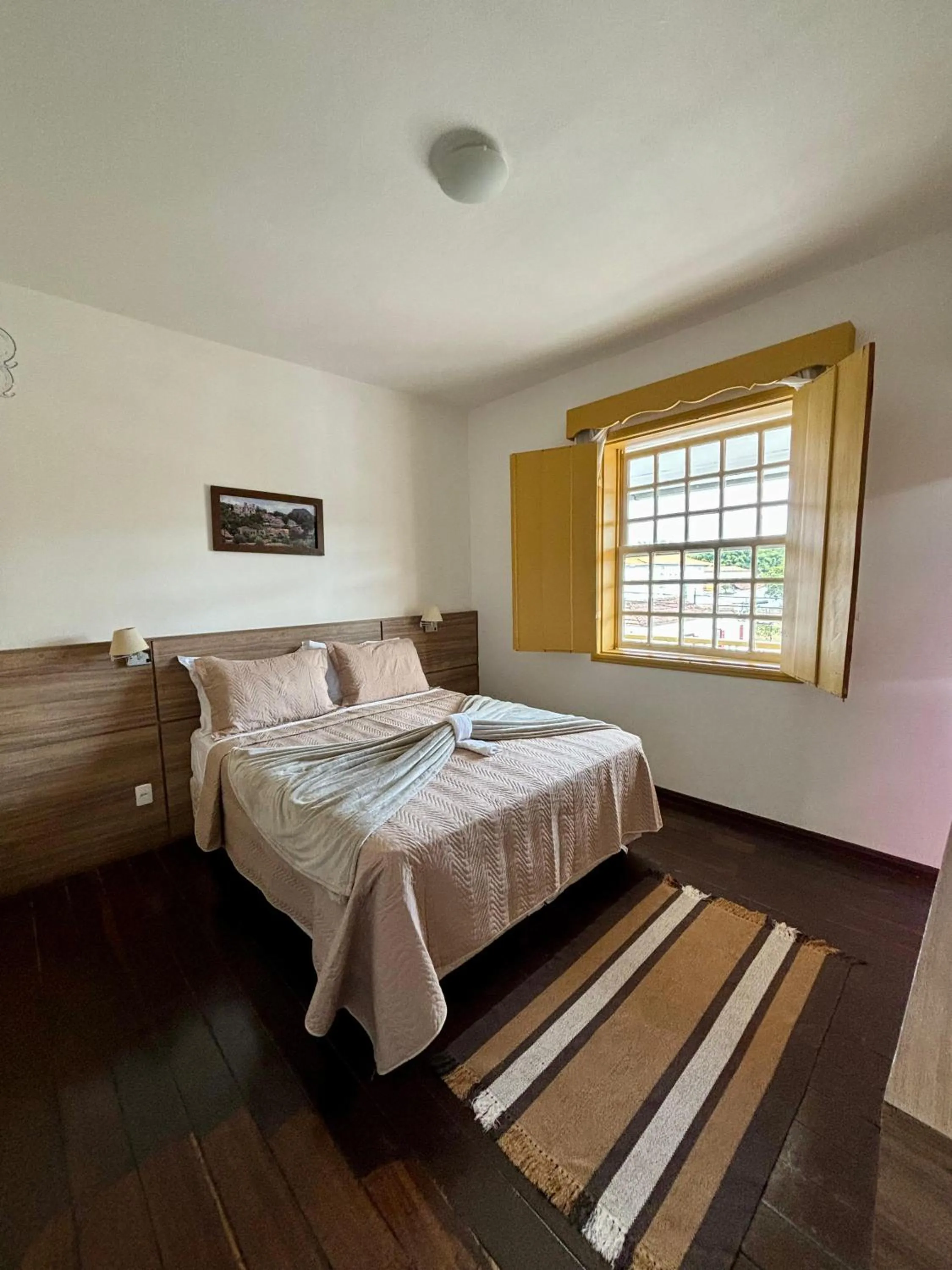 Bed in Pousada o Amanhecer