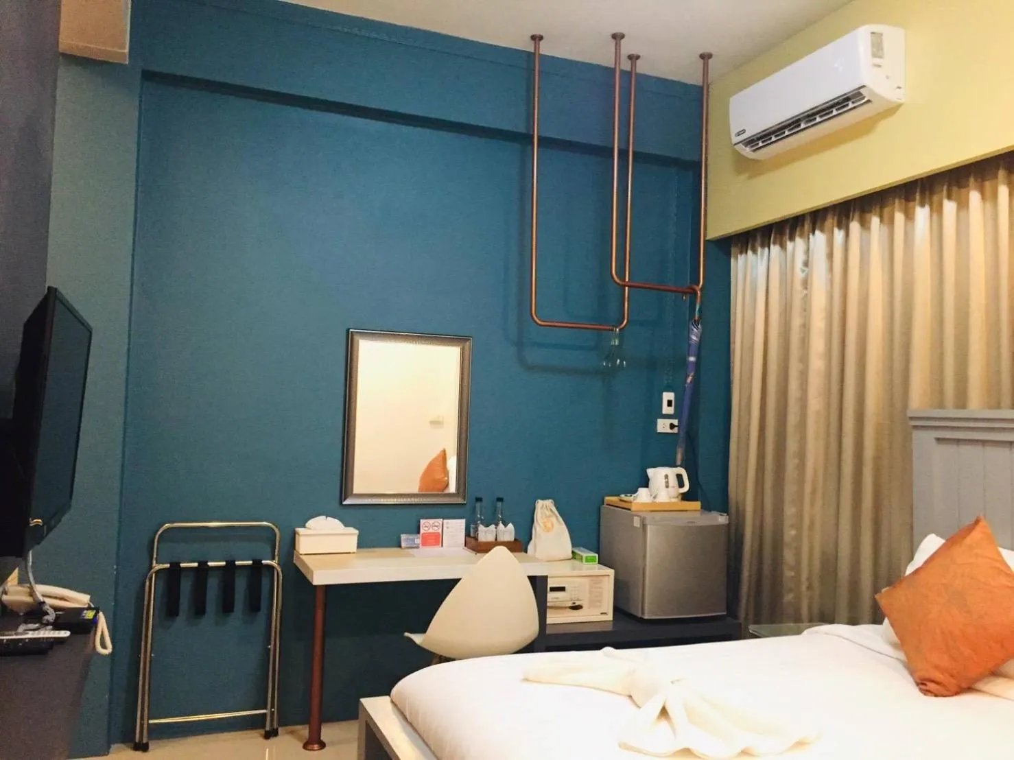 Bed in The Iconic Hotel Ranong