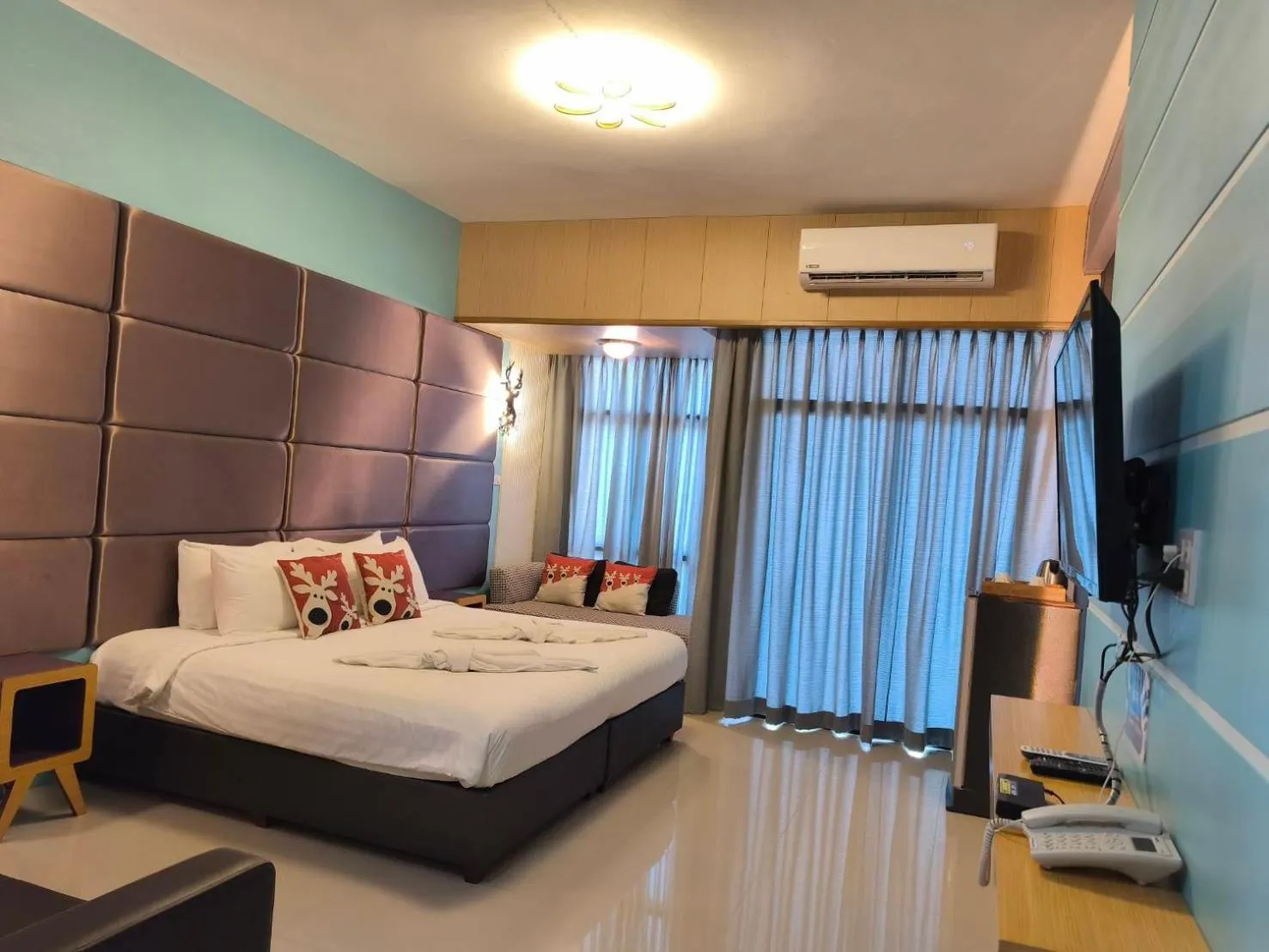 Bed in The Iconic Hotel Ranong