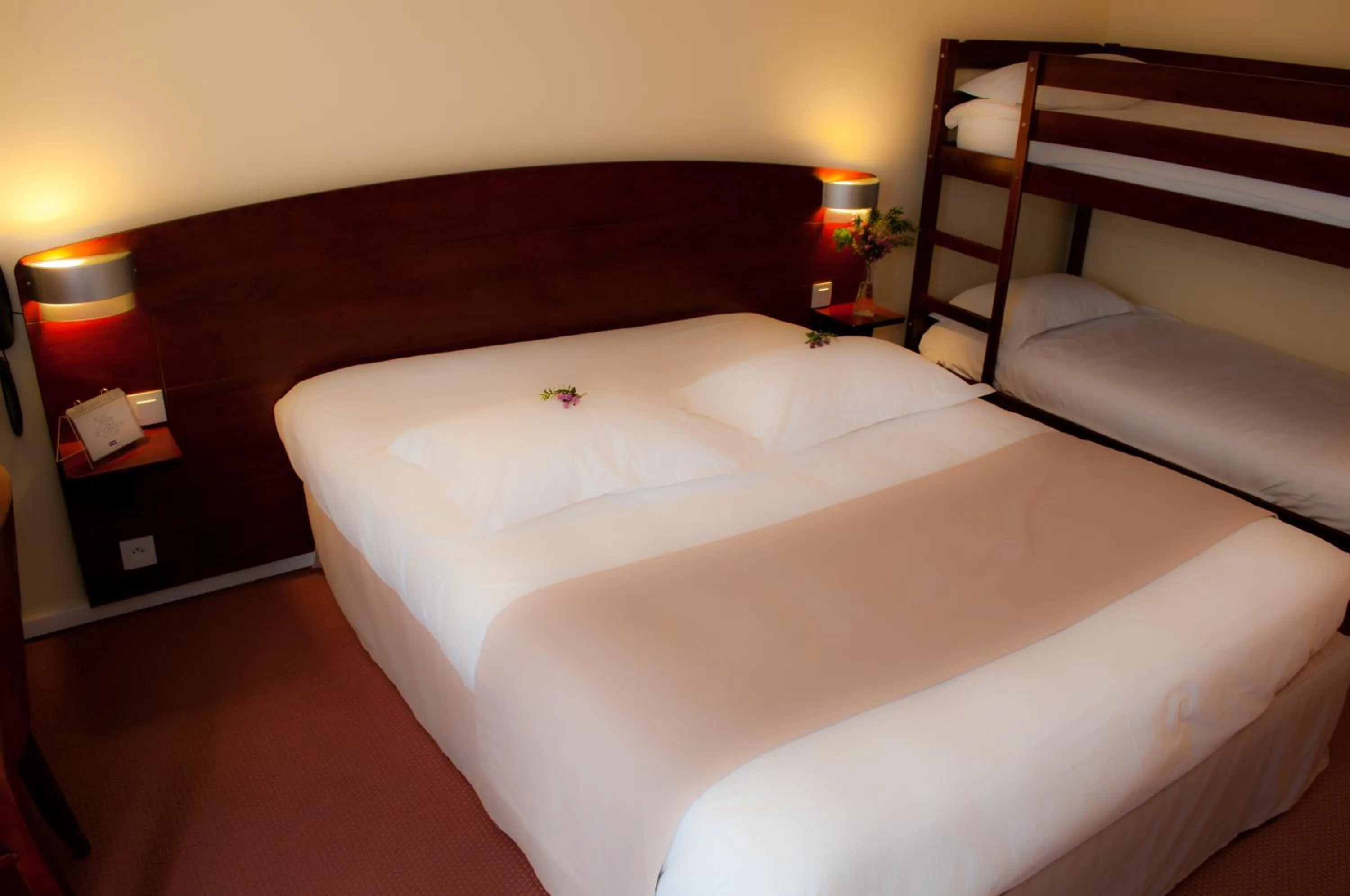 Bed in Kyriad Saint-Malo Dinard