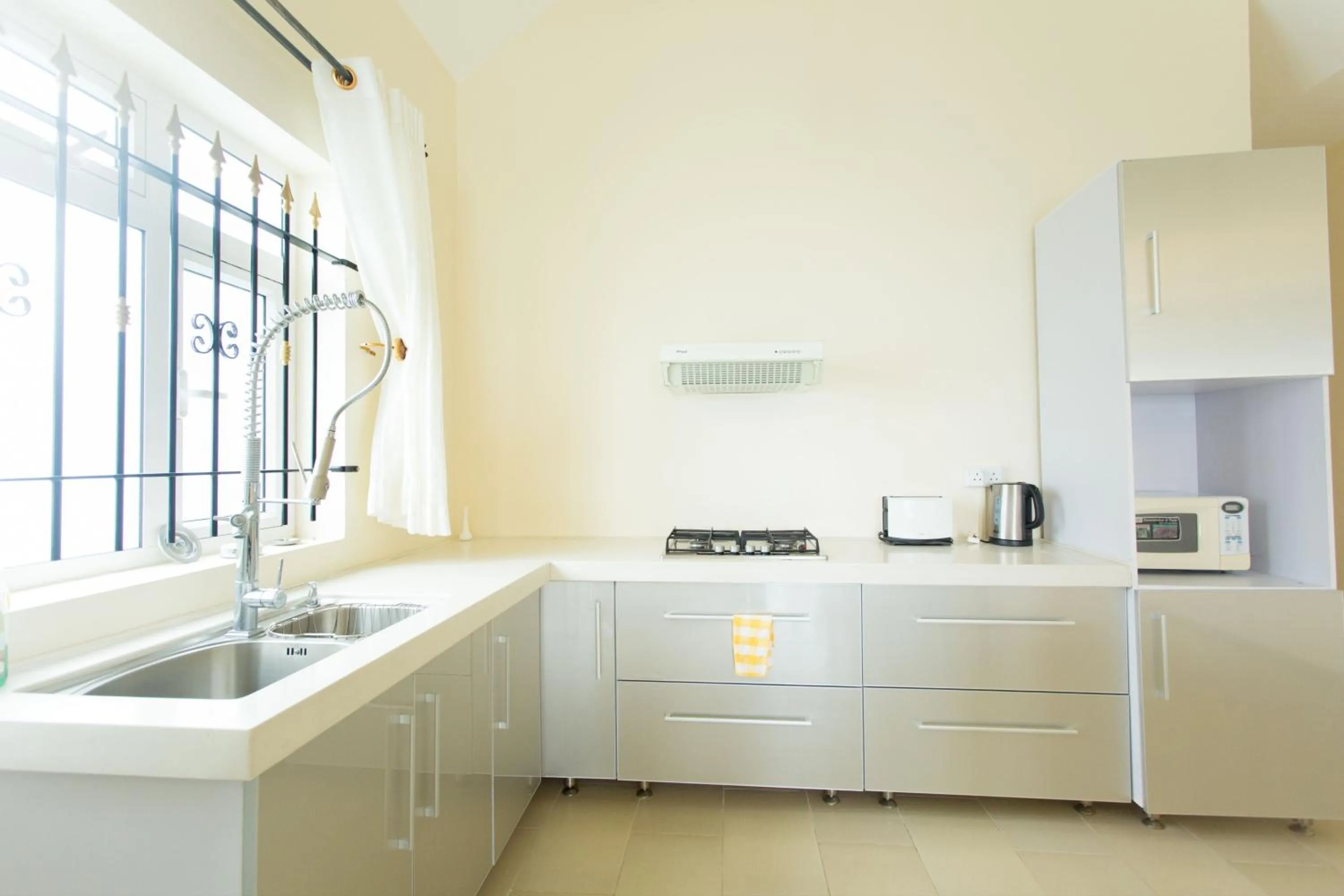 Kitchen or kitchenette in Garden Villas