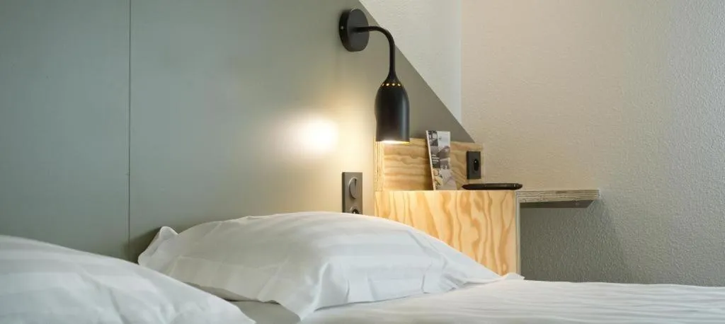 Bedroom, Bed in Brit Hotel Essentiel Arverne - Clermont-Ferrand Sud