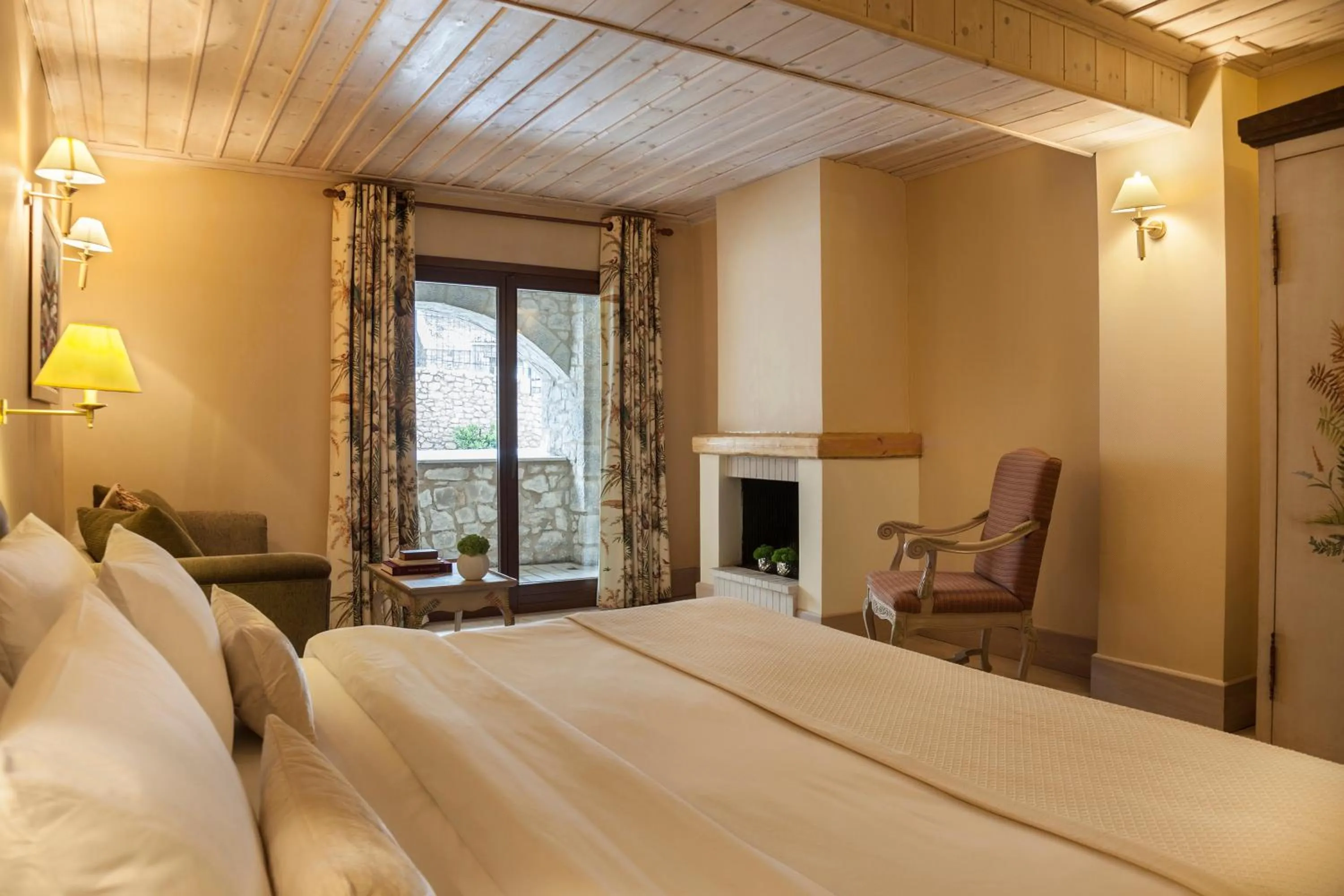 Seating area, Bed in Santa Marina Arachova Resort & Spa